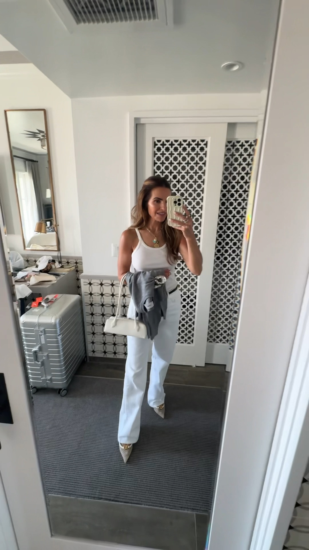 night 4 in santa barbara heading to see another friends gorg home then off to dinner at yummy italian restaurant @ospi & it was amazing! 

wearing the perfect california look: a vintage white tank, white denim, my new wool emoji sweater, kitten heels & fav bag of the summer! 

tank runs runs small i sized up to a M

denim runs tts im wearing a 2 

#LTKStyleTip #LTKFindsUnder100 #LTKTravel