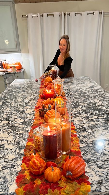 Made all this center piece by hand believe it or not! Since I have a day job, ha, this took me a while to put together as I individually glued each leaf onto the runner which started out as a blank canvas then I decorated it with candles , pumpkins, and candy corn. Perfect piece for the holidays! Comment below and let me know your thoughts! 🤎🦃

#LTKhome #LTKHoliday #LTKSeasonal
