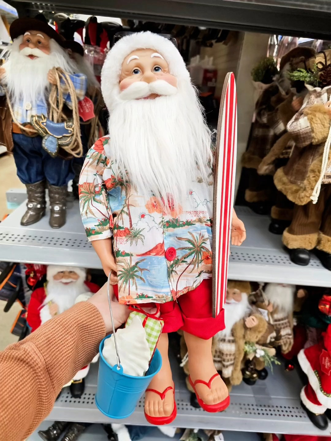 Bringing a little island life to the holidays 🌴🎅 This surfing Santa figurine is the perfect reminder of our time living on island full of sunny days, ocean waves, and Christmas with a tropical twist! 

 #LTKHoliday #LTKSeasonal #LTKHome