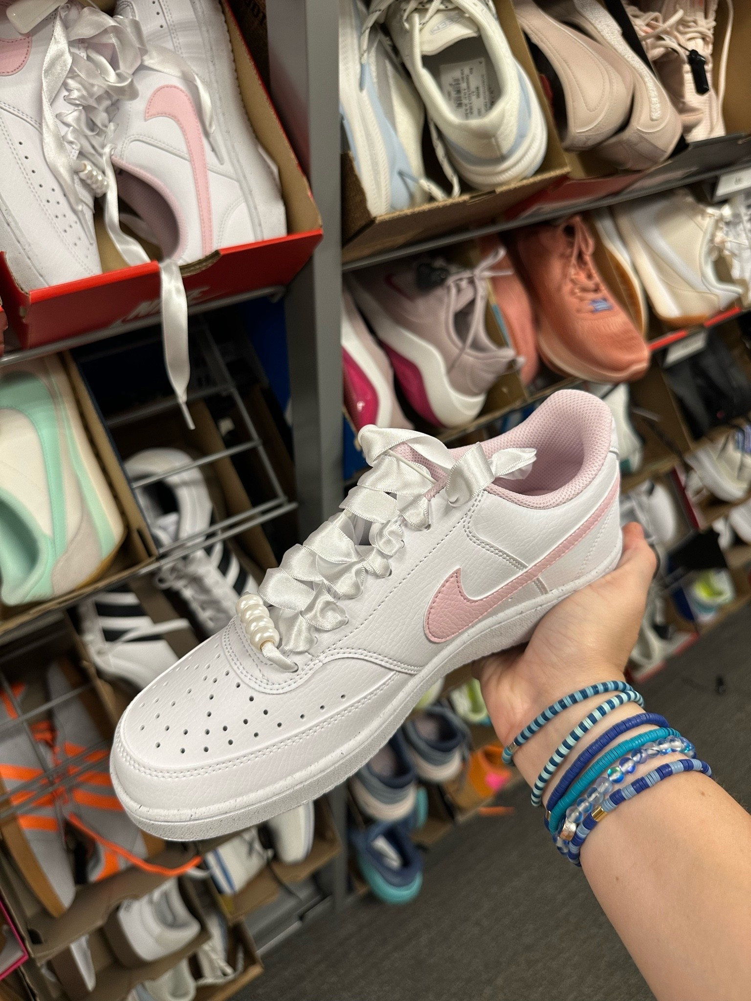 Love these pink & white Nikes with ribbon laces & beads! These are so cute and girly! They’re on sale for $71! Range from sizes 5-12!

#LTKActive #LTKSaleAlert