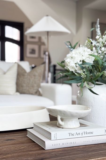 I am loving my latest neutral coffee table styling - this is such a bright space!

Home  Home decor  Home favorites  Spring home decor  Faux florals  Living room inspo  Coffee table styling  Neutral home  Modern home

#LTKSeasonal #LTKhome