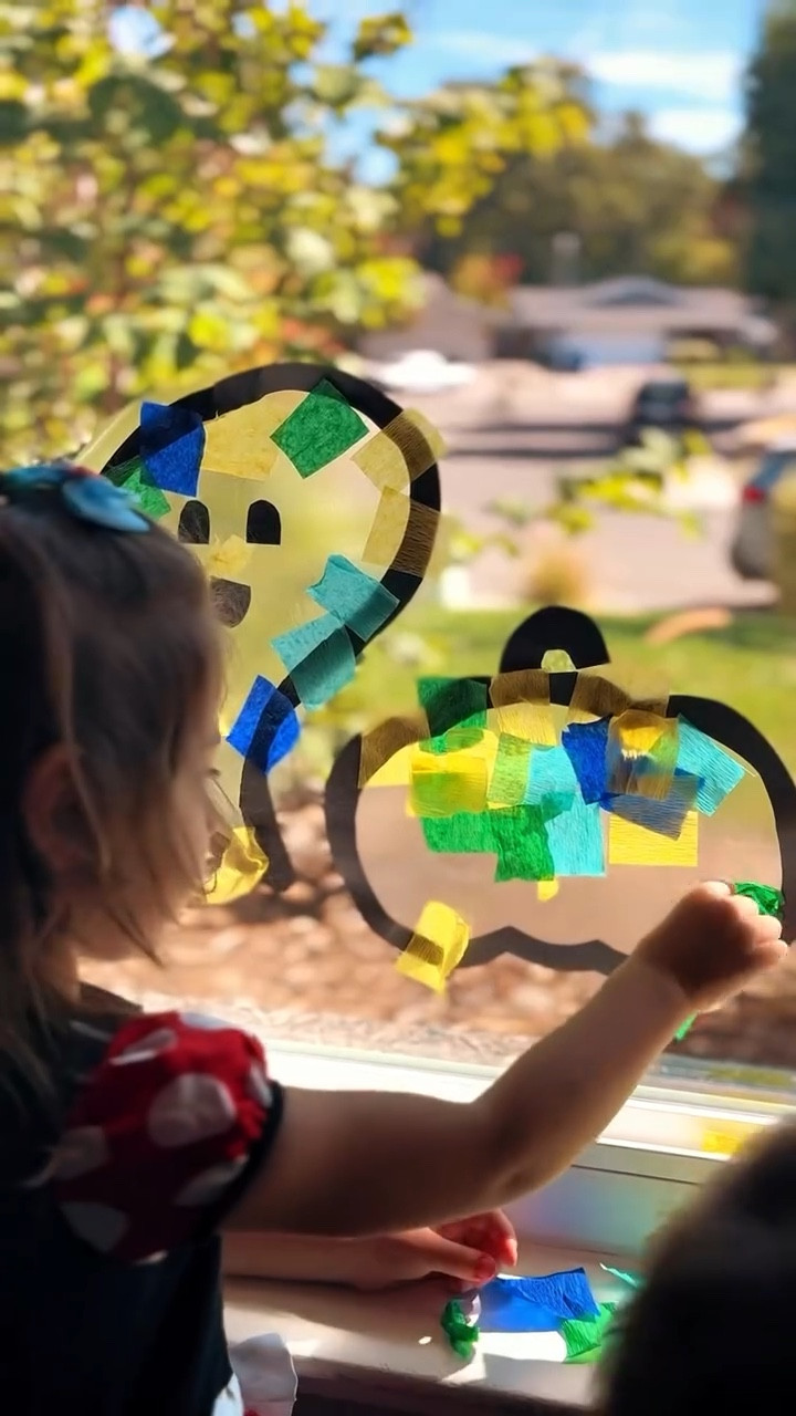 Halloween window decor made easy (because moms need a win in life) 👻🎃

Setup is super simple: cut black outlines of any spooky shapes you want, stick the contact paper to the window (yes, peeling the backing had me temporarily questioning my life choices 😅), and hand over tissue paper or in our case crêpe paper for the kids to decorate.

Now we didn’t even have fall colors on hand… and somehow they turned out both cute and spooky. Ok, maybe more on the cute side 🤗

#halloweencrafts #spookyfun #windowdecor #toddlercrafts #preschoolcrafts #spooktacularfun #simpleplayideas #playmatters

#LTKKids #LTKHalloween #LTKFamily