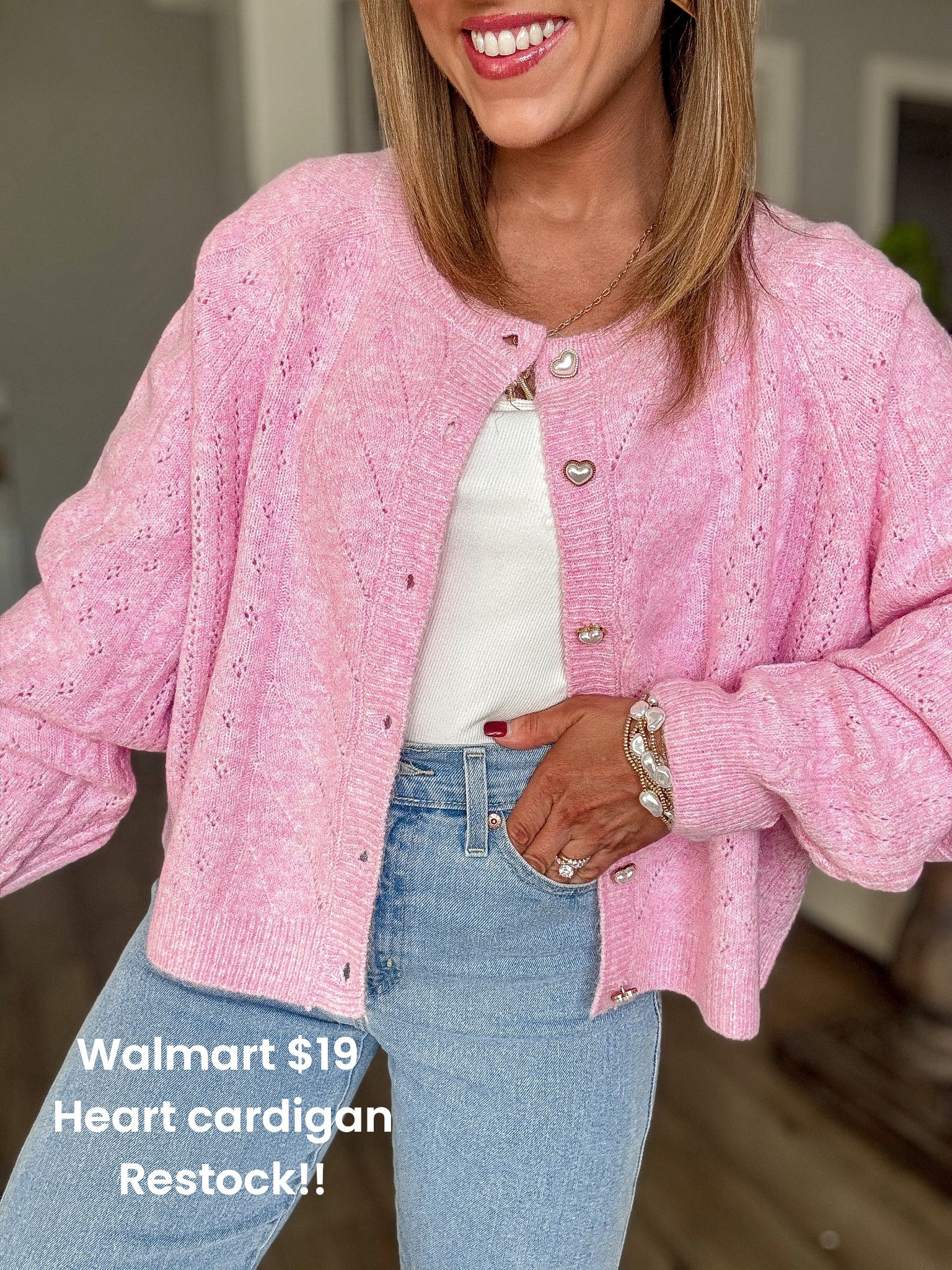 Obsessed is an understatement 😍 This Walmart heart-button cardigan is officially restocked and still just $19 — the perfect mix of cute + cozy for everyday wear. I love the soft pink knit, delicate pointelle texture, and those sweet heart buttons that make this feel way more expensive than it is. Styled here with a simple tank and classic denim for an easy school drop-off outfit, weekend errands look, or casual date-day vibe.

If you’ve been looking for an affordable Valentine-inspired cardigan, a lightweight spring layering piece, or a budget-friendly Anthro-style sweater, this one is a must-grab before it sells out again. Head-to-toe Walmart and proof that the best finds don’t have to cost a fortune 💗

#walmartfashion #walmartfinds #walmartstyle #heartcardigan #valentinesoutfit #affordablefashion #budgetstyle #springoutfitideas #everydayoutfit #momstyle #casualchic #walmartnewarrivals #lookforless #pinkcardigan