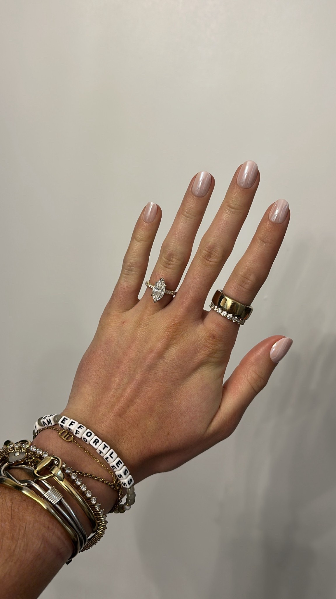 A white mani topped with a shiny chrome glazed effect in an extra short round shape. A new mani to make any outfit not to mention done in minutes at-home, thanks to @oliveandjune 💅💓 These are my new favorite press-on nails from Olive and June, Who knew press-on nails could save so much time and money!?✨ 🚨Be sure to save this post for the next time you do press on nails for all the good tips and tricks! @target
Be sure to apply even pressure on all edges of the nail, not just the center. 
Avoid washing your hands or getting your nails wet for at least an hour after application. 
Start with the pinky and always end with the thumb. 
More pressure = the longer your nails will stick. 
Layout the corresponding nail size for each nail before application.
Size down in nail if you’re in between sizes! Ex. If the six feels kinda big, go with the five. 
Create a note in the notes app of your phone of your nail sizes to save time.

#LTKBeauty #LTKHoliday #LTKgrwm