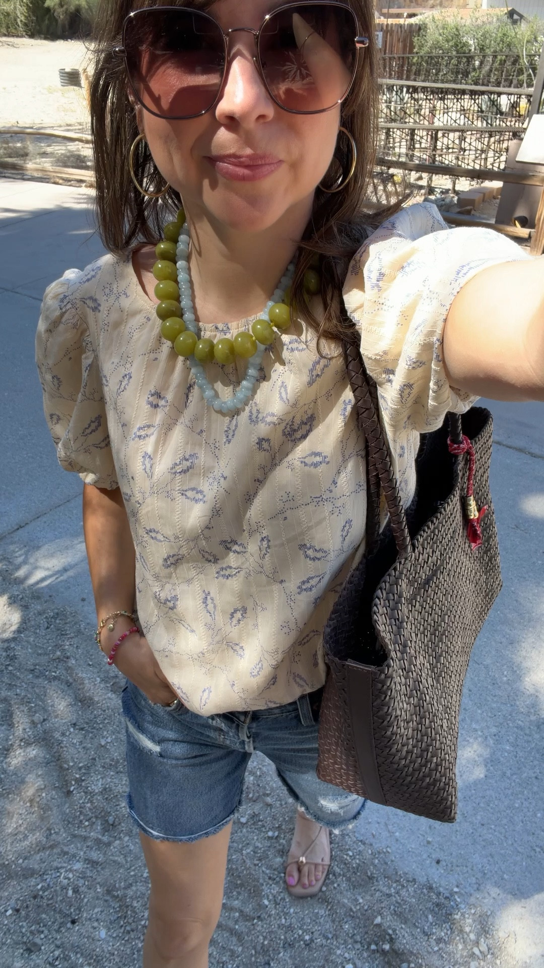 An easy summer outfit I keep repeating: a lightweight printed blouse, denim shorts, and simple sandals. Effortless, flattering, and pieces you’ll wear on repeat. I’m 5’2 for reference.
Top XS 
Shorts 25

#LTKmomlife #LTKPetite #LTKootd