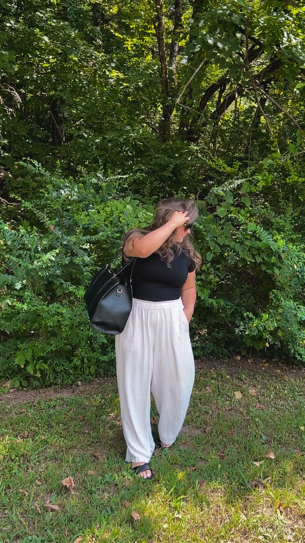 This purse has TWO cupholders, a laptop sleeve, and SO. MUCH. ROOM. for everything you could possibly need!! Also my wide leg linen pants and black cropped tee are both on sale rn!

#LTKSaleAlert #LTKMidsize #LTKFindsUnder50