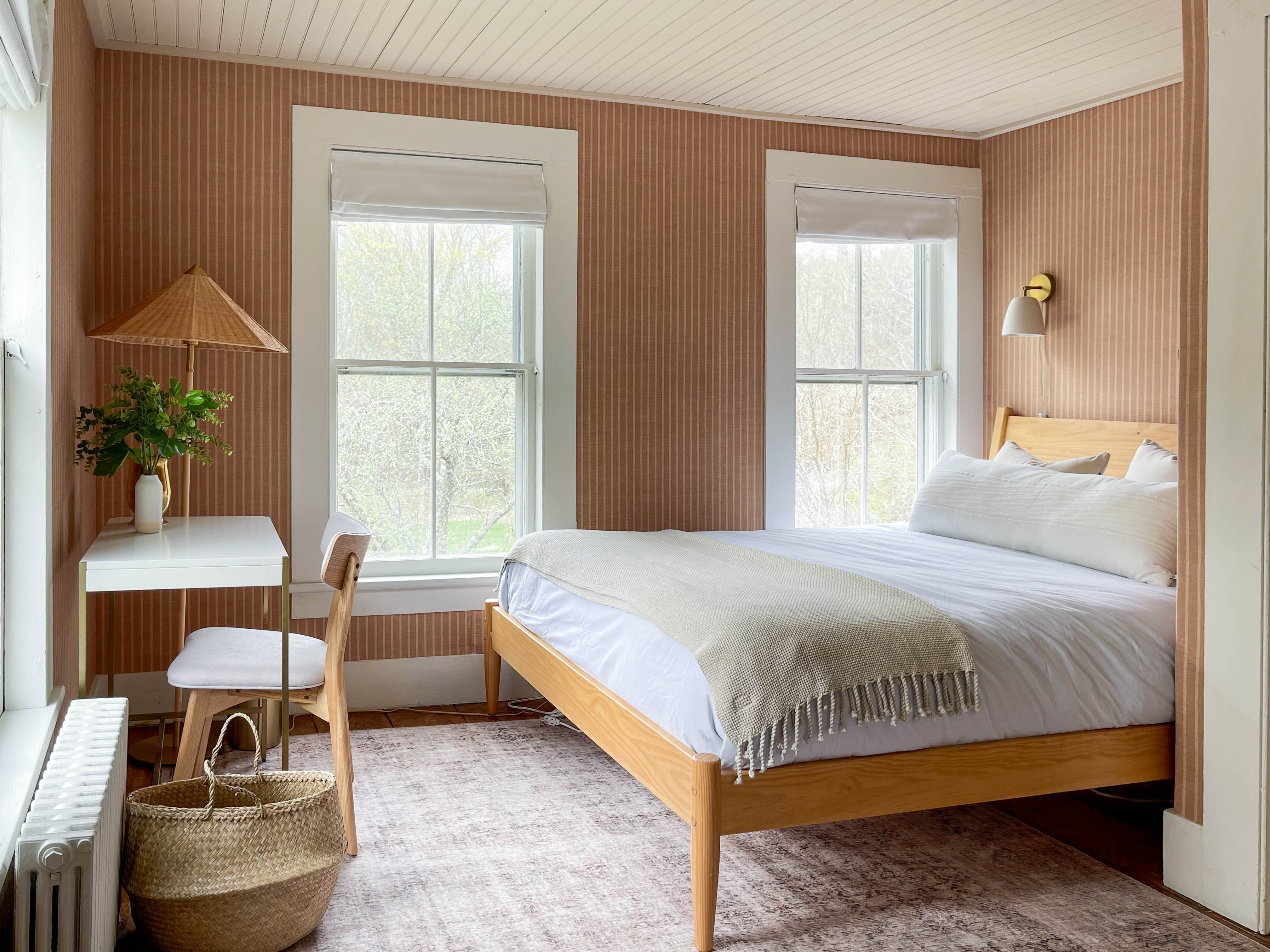 Striped wallpaper paired with simple wood pieces throughout this bedroom.
Linked exact and similar pieces below. 

 #bedroomdesign #neutralhome #interiordesign 

#LTKHome #LTKSaleAlert