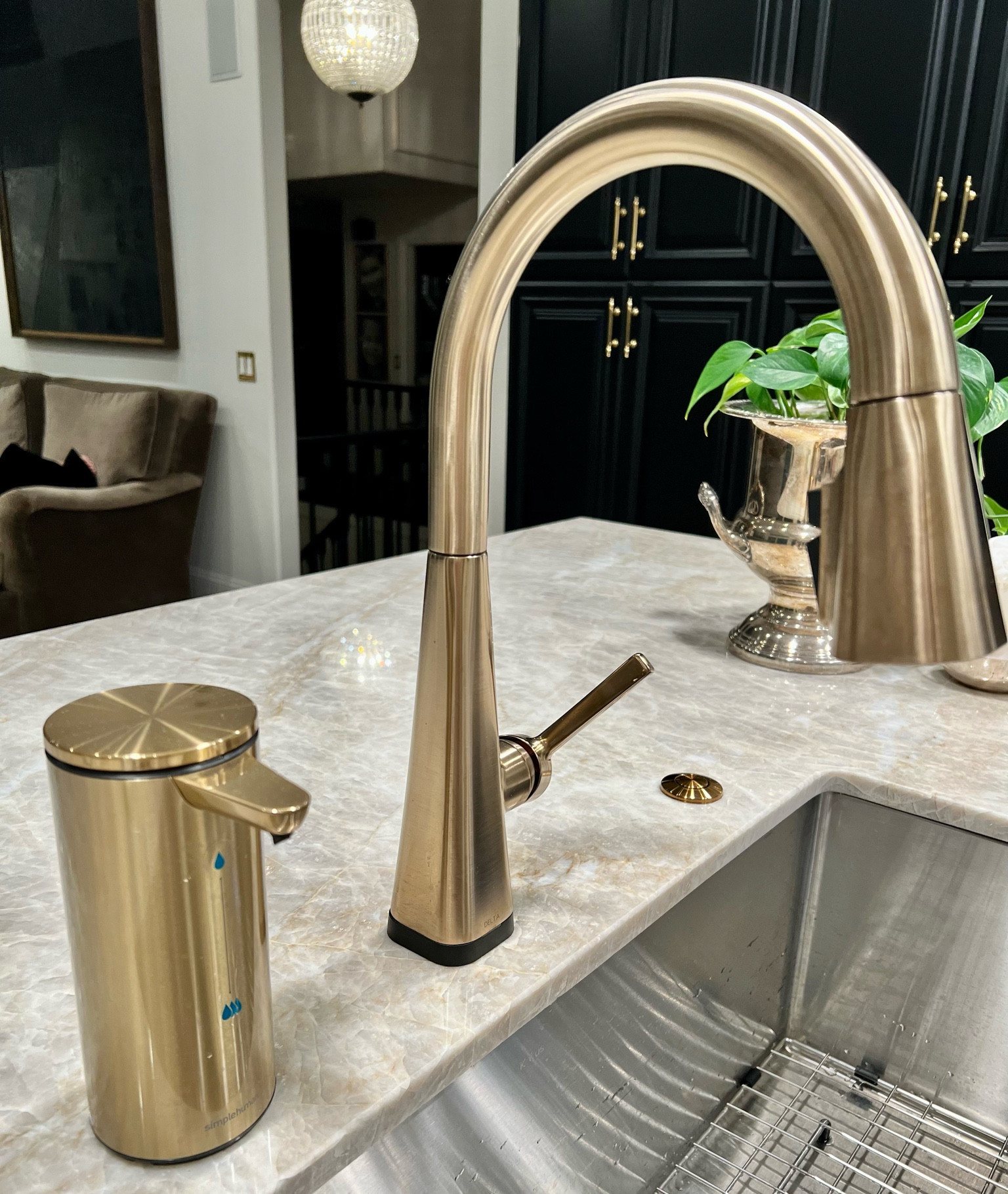 Delta touchless pull out kitchen faucet. Brushed brass. Champagne bronze. Smart sensor soap dispenser. 

#LTKstyletip #LTKunder100 #LTKhome