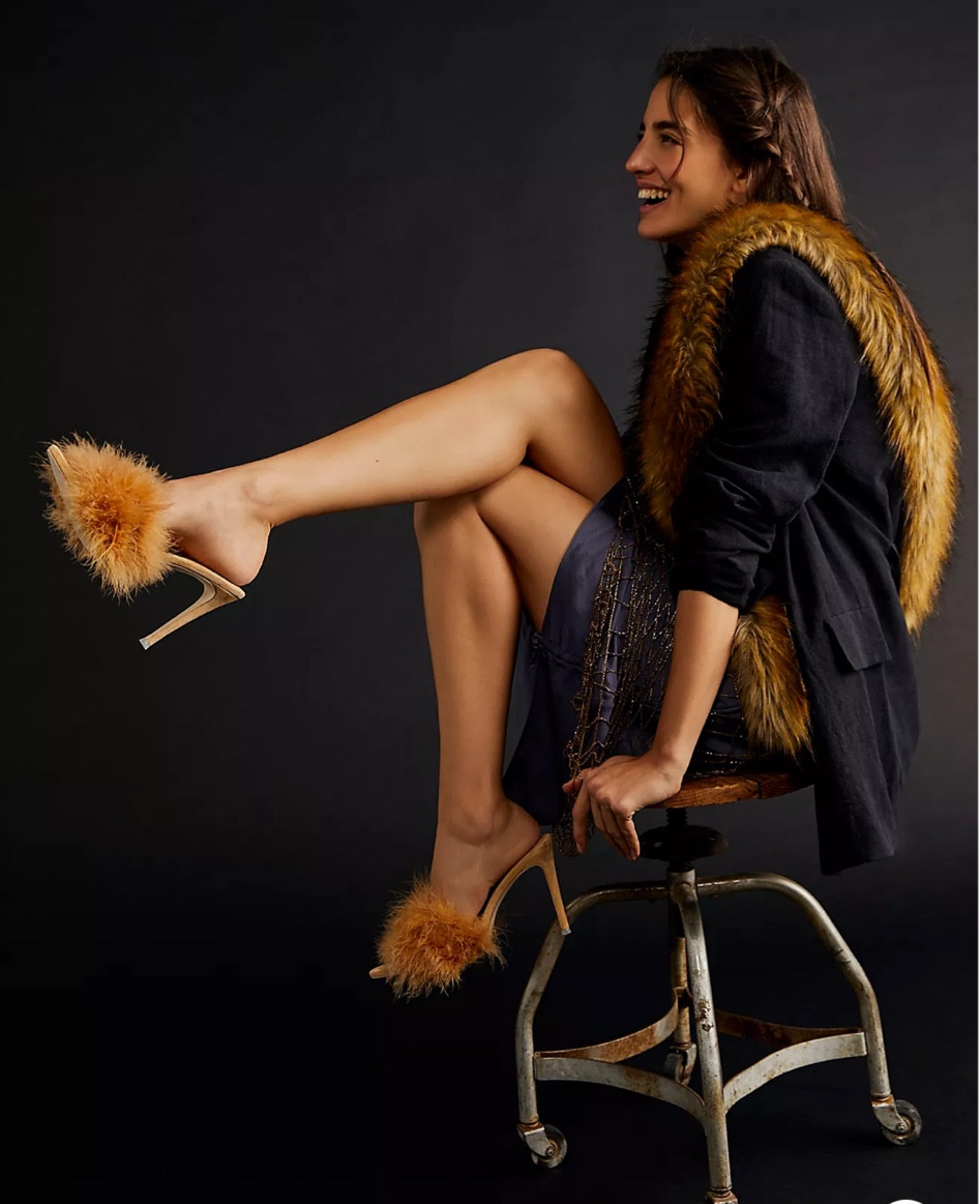 Everything from the faux fur vest, to the black black blazer, to the mariboo feather heels is fabulous!!

#LTKSeasonal #LTKHoliday #LTKstyletip
