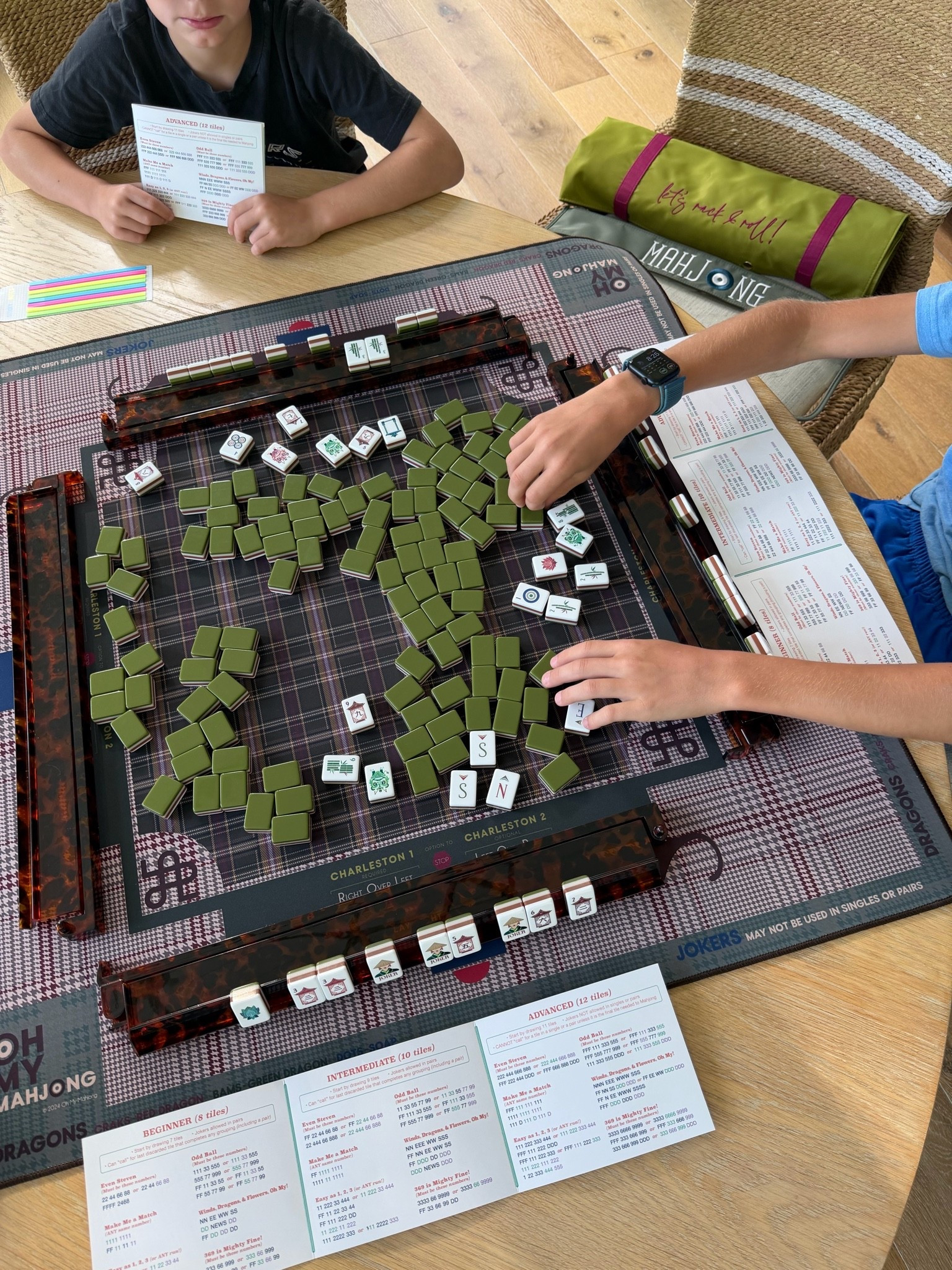 Teaching my kids to play Mahjong! Here’s all the details on my mahjong set, including the kids mini Mahj cards, the tiles, mat, pushers, shufflers, and storage.

#LTKHome #LTKmomlife #LTKKids