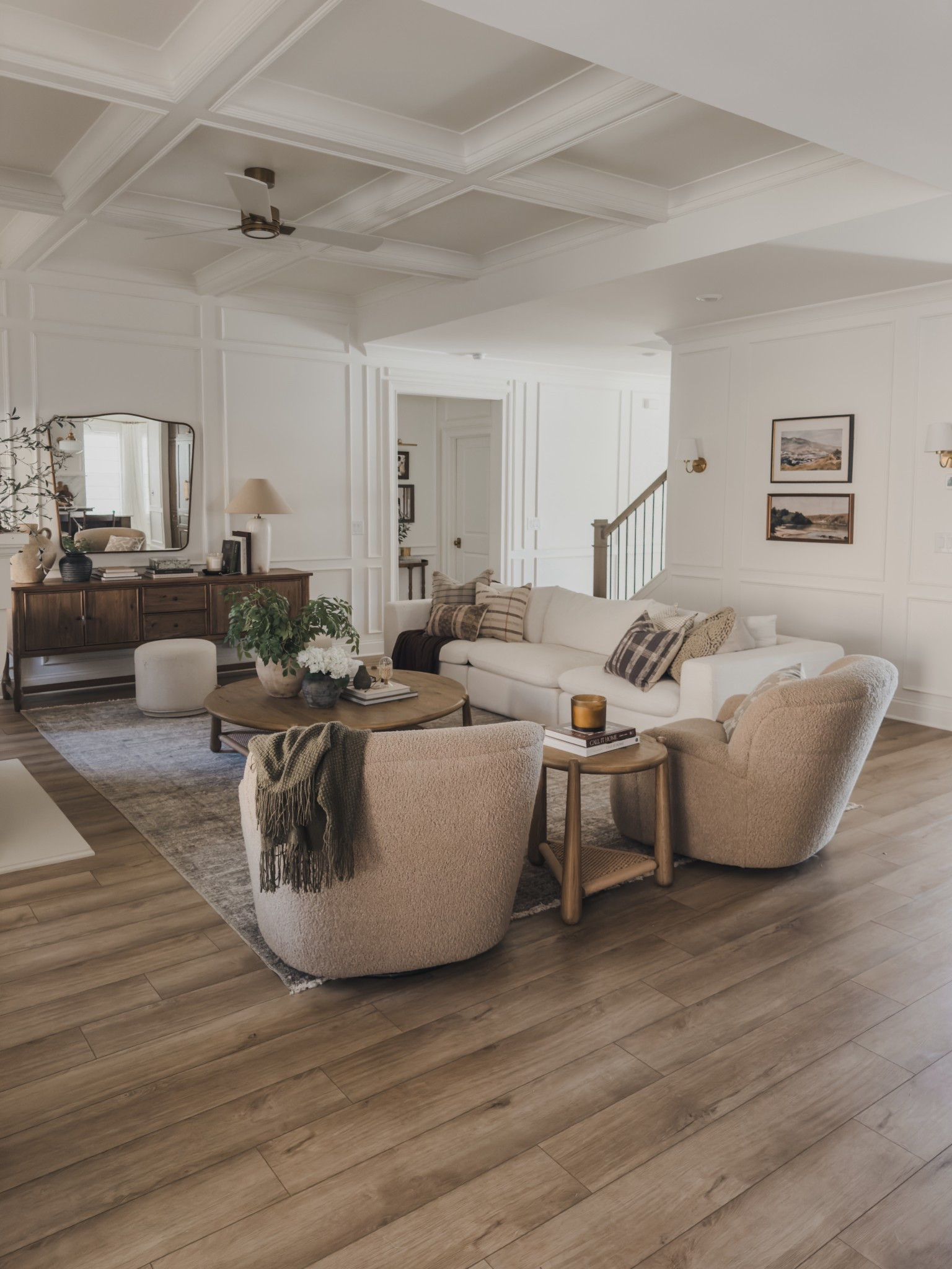 Refreshing my living room space for the new year has never felt better! Leaning into quality over quantity - including my favorite furniture pieces that transition well through each season. From cozy, oversized swivel chairs, my sideboard with plenty of storage, my all time favorite Amber Lewis x Loloi rug, and the coziest couch that is 100% machine washable to create an aesthetic and functional space.

Home finds, neutral home inspo, furniture favorites, neutral wood tones, linen couch, swivel accent chair, round coffee table, sideboard details, collected style, accent table, fan details, throw pillow, neutral area rug, ottoman favorites, neutral decor, throw blanket, living room refresh, Loloi, Four Hands, Amber Lewis, Chris Loves Julia, Wayfair, Etsy, found it on Amazon, Castlery, Visual Comfort,  Pottery Barn style, shop the look!

#LTKSeasonal #LTKHome