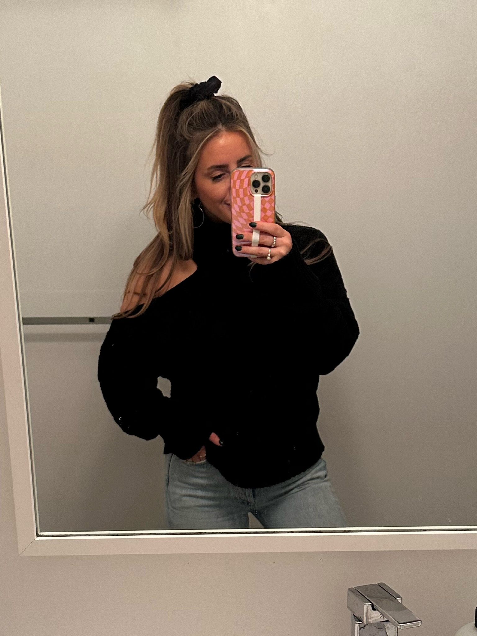 Black cutout turtleneck, agolde jeans, black scrunchie, phone case & strap 

#LTKunder100 #LTKSeasonal