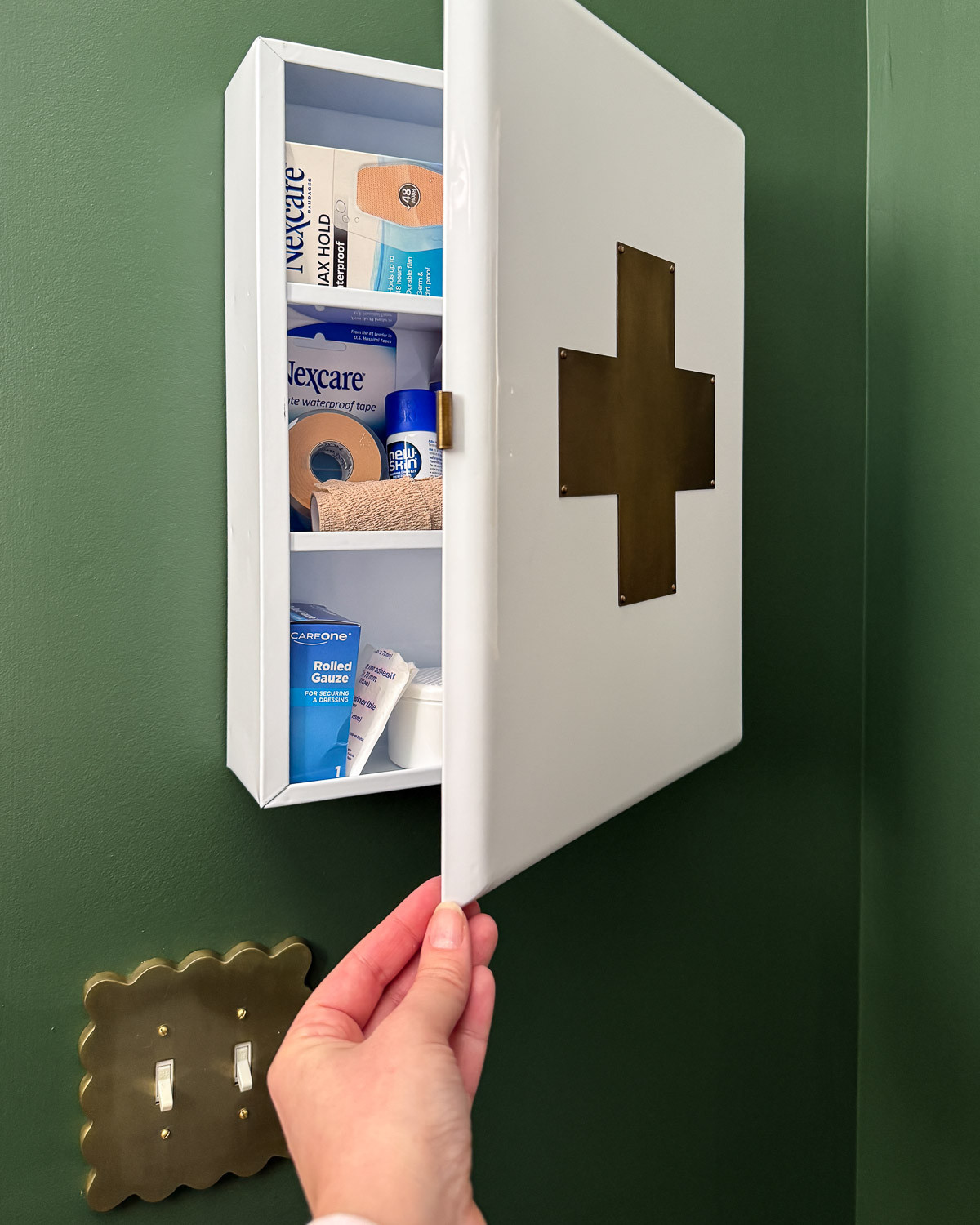 It may surprise you that this metal first aid kit that we hung in our powder room is my favorite thing in the room. It's cute and practical. Win-win. I've linked it below, as well as some similar options. 

 #LTKHome #LTKSaleAlert #LTKFindsUnder50