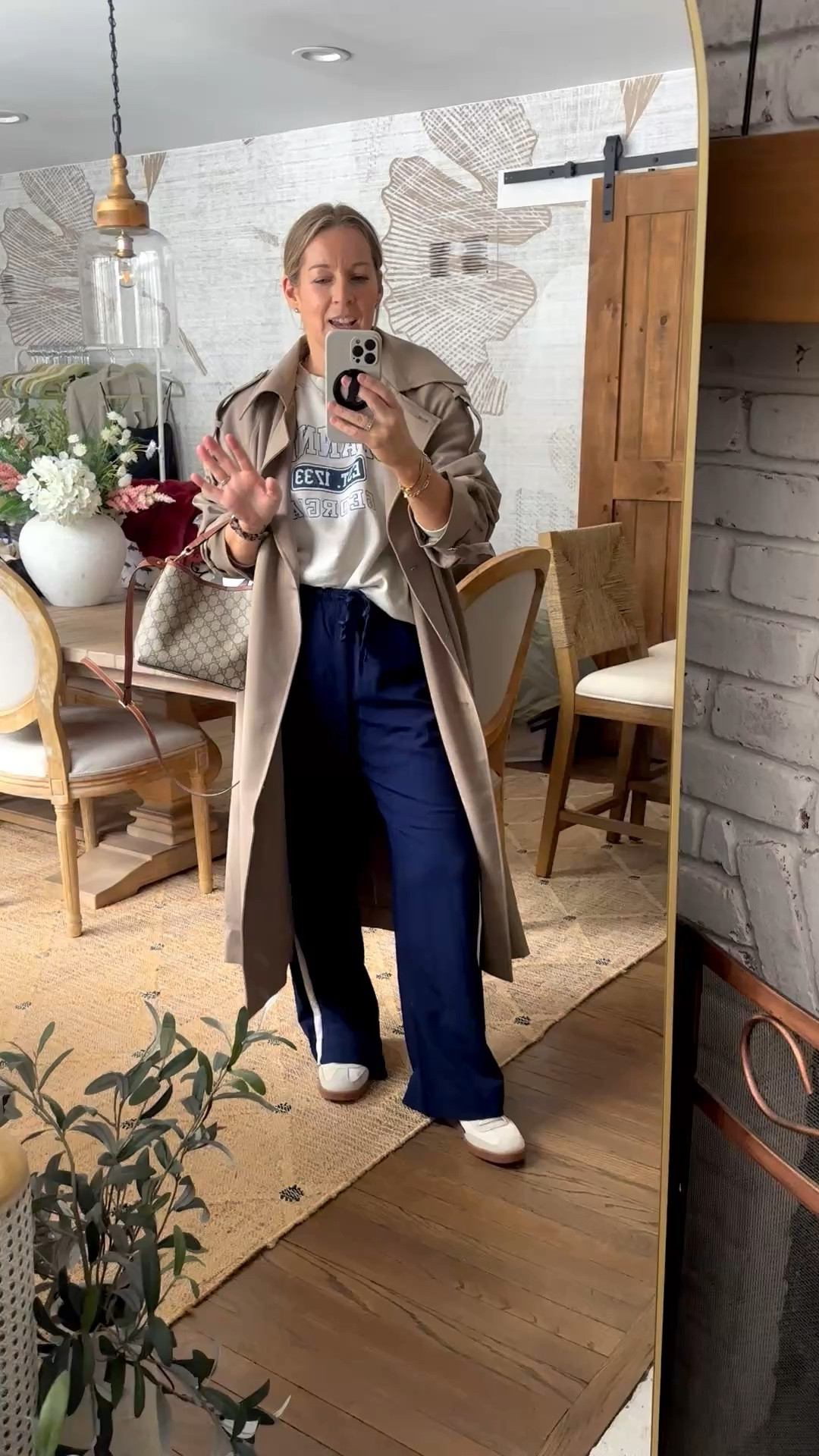 I honestly feel so much more put together when I style sweats then when I try to dress up! I am wearing a sweat sweatshirt that I got from my visit to Georgia, but I linked a couple that would match the sweatpants as well and looks super low-key and chill. These pants are just like the Aritzia lodge pants. I actually have them and have shared them with you in ivory and black as well. They are so comfortable and the length is perfect for our height and I wear my true size medium. They don’t need to be steamed or ironed because I feel like they washed really nice but they steam really easily if you have to, and I just absolutely love this track pant style. I am so here for this trend! The trench is next level so amazing!! I’m in a small bc it runs big! Color brindle :) effective and stylish…tried and true! 

#LTKdayinmylife #LTKootd #LTKMidsize

#LTKdayinmylife #LTKootd #LTKmomlife