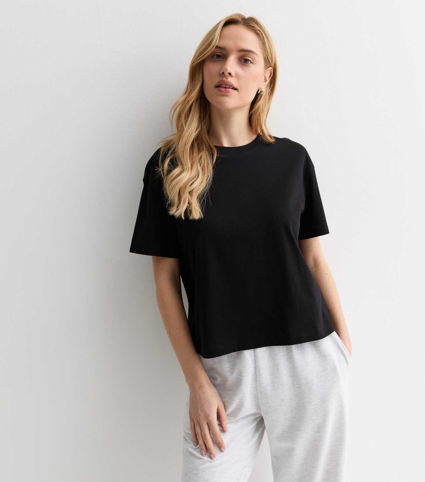 Black Boxy Cotton T-Shirt 
						
						Add to Saved Items
						Remove from Saved Items | New Look (UK)