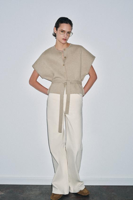CARDINGAN with round neck and short sleeves. Self-fabric belt detail. Front button closure. | Zara US