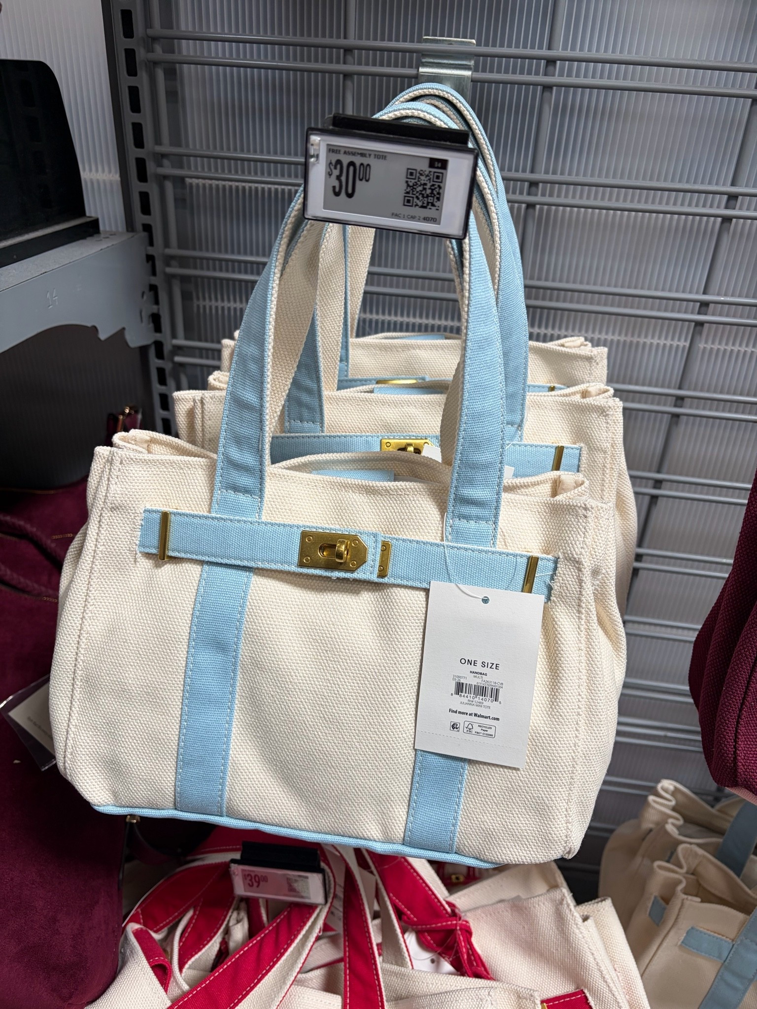 Free Assembly's Small Tote Handbag is all about quiet luxury, delivering a high-end aesthetic in laid-back cotton canvas. Effortlessly classic, this tote charms with subtle pops of color and a unique belted design with a front buckle. The spacious interior is just-right for daily essentials like your phone, keys, wallet and a lip gloss or two. This tote is the perfect chic addition to your handbag collection. Only at Walmart

#LTKootd #LTKSwim #LTKTravel