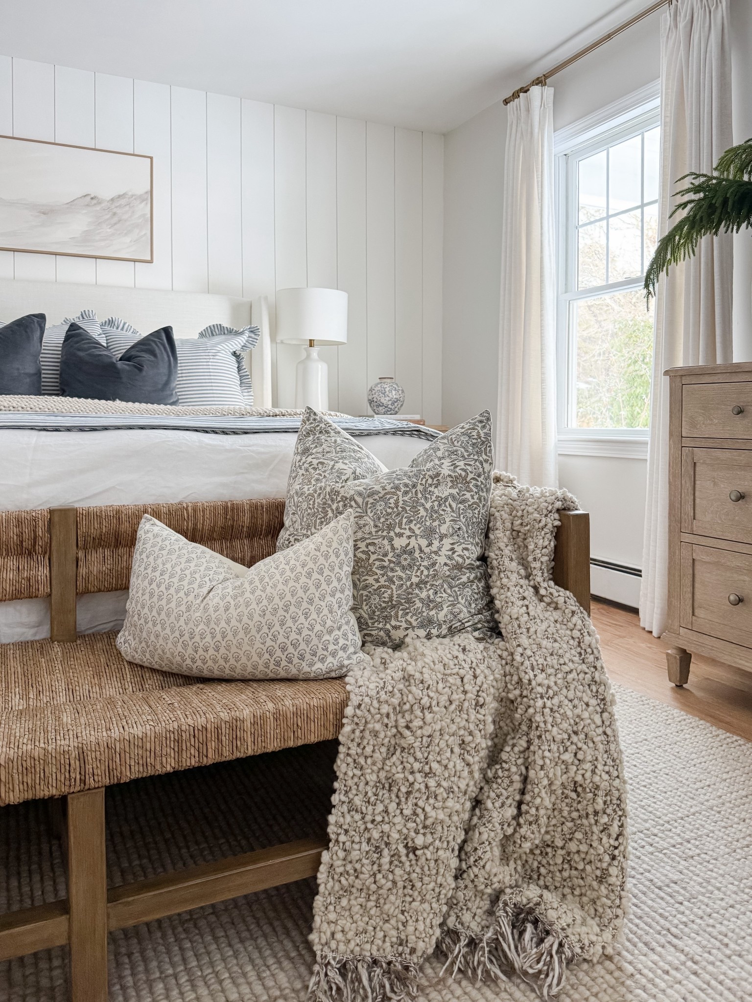 Layered bedding, warm wood tones, and soft textures make this coastal bedroom feel calm and complete. coastal bedroom decor, neutral bedroom, upholstered bed, woven bench, coastal home style, serene bedroom, timeless interiors, bedroom inspiration, sherricalnanhome


#LTKHome