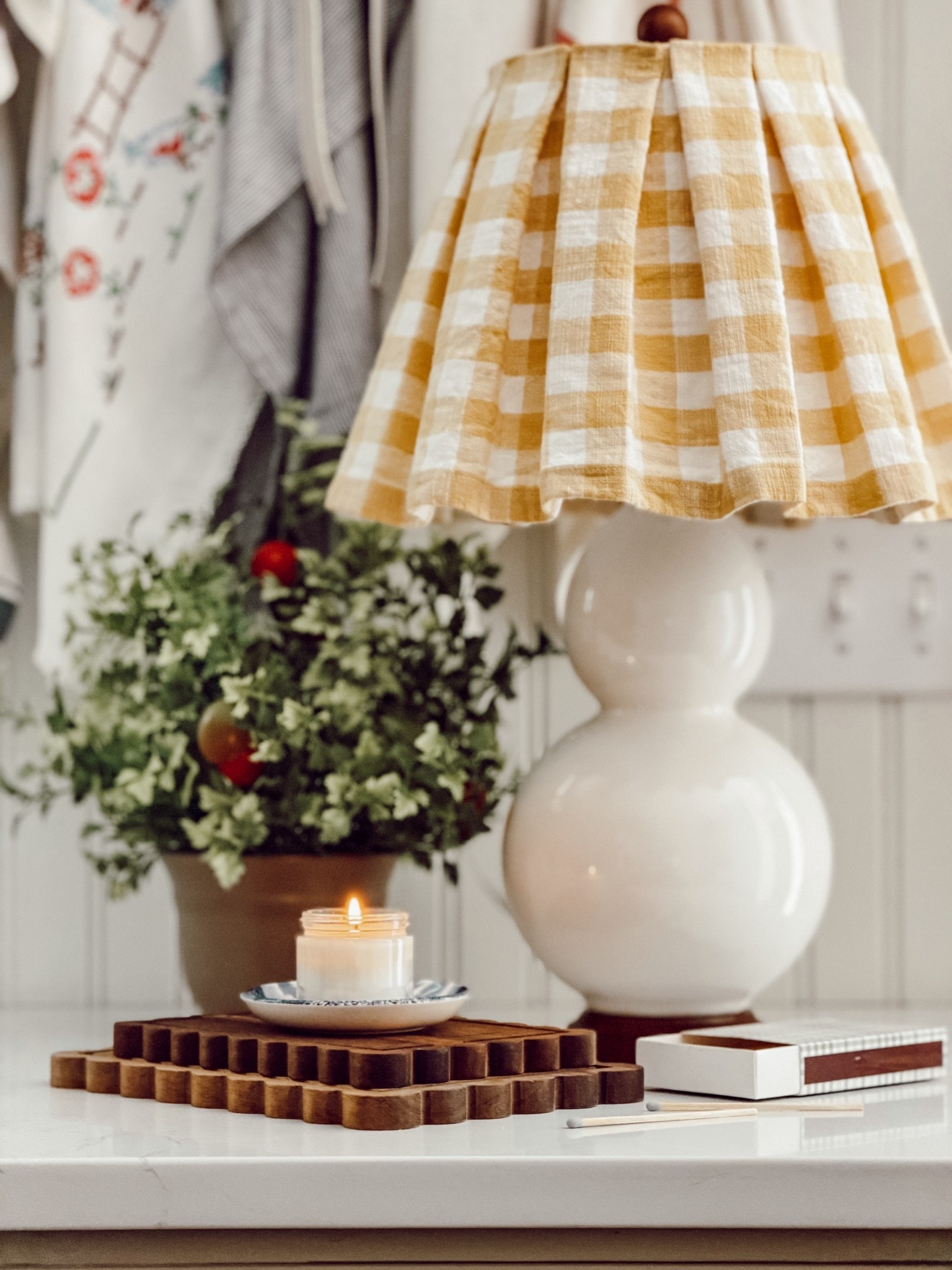 Add a little touch of summer to your kitchen with this faux tomato plant.

#LTKHome #LTKSeasonal