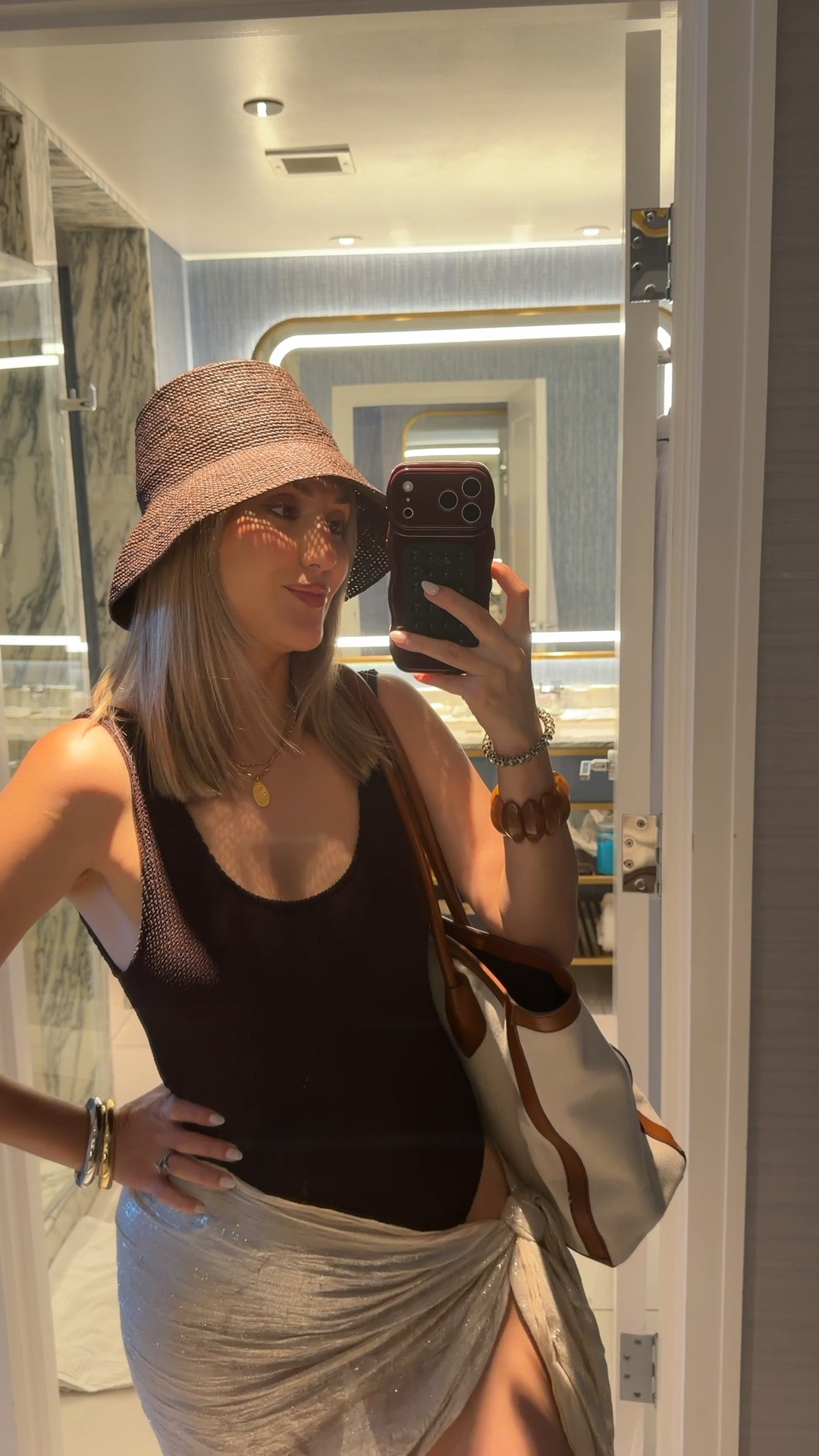 Pool attire! 

Brown scrunchie one piece swimsuit 
Bucket hat 
Sunglasses 
Cuff bracelets 
Jelly sandals TTS 
summer handbag 

Beach vacation 
Pool outfit 
Sarong

#LTKSwim #LTKTravel #LTKdayinmylife