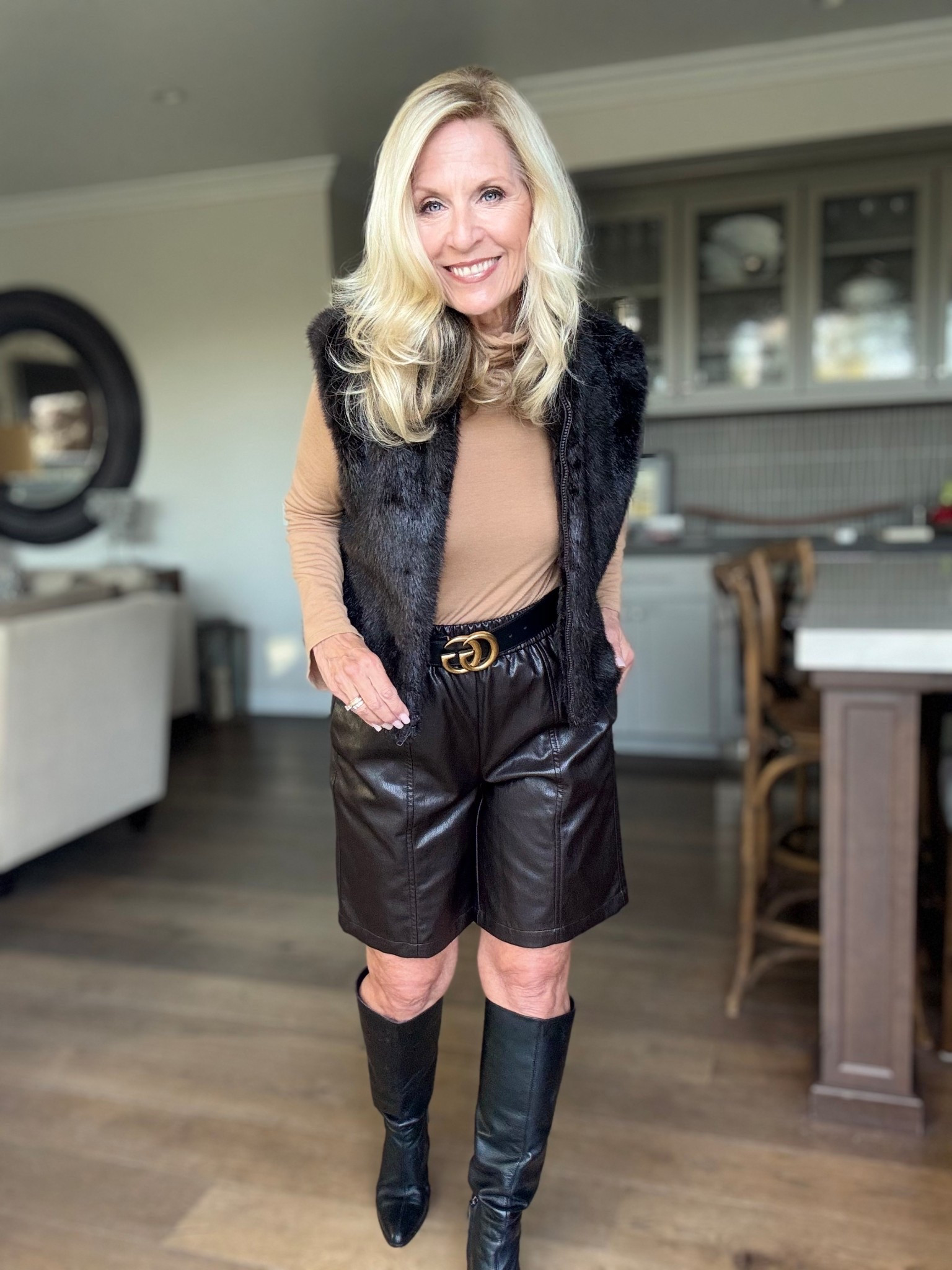 How to style leather shorts!

I never thought I’d be wearing shorts in December, but here I am and I love this style!

I found this look in @zara and I love mixing the back accessories with the brown shorts and faux fur vest!

Not chilly enough for a jacket? This vest is perfect! I will also link other similar pieces in my LTK!

This would be great for brunch, lunch out with the girls or date night! Would you wear them??

Follow me for more 50+ holiday style inspiration.



#LTKOver40 #LTKHoliday