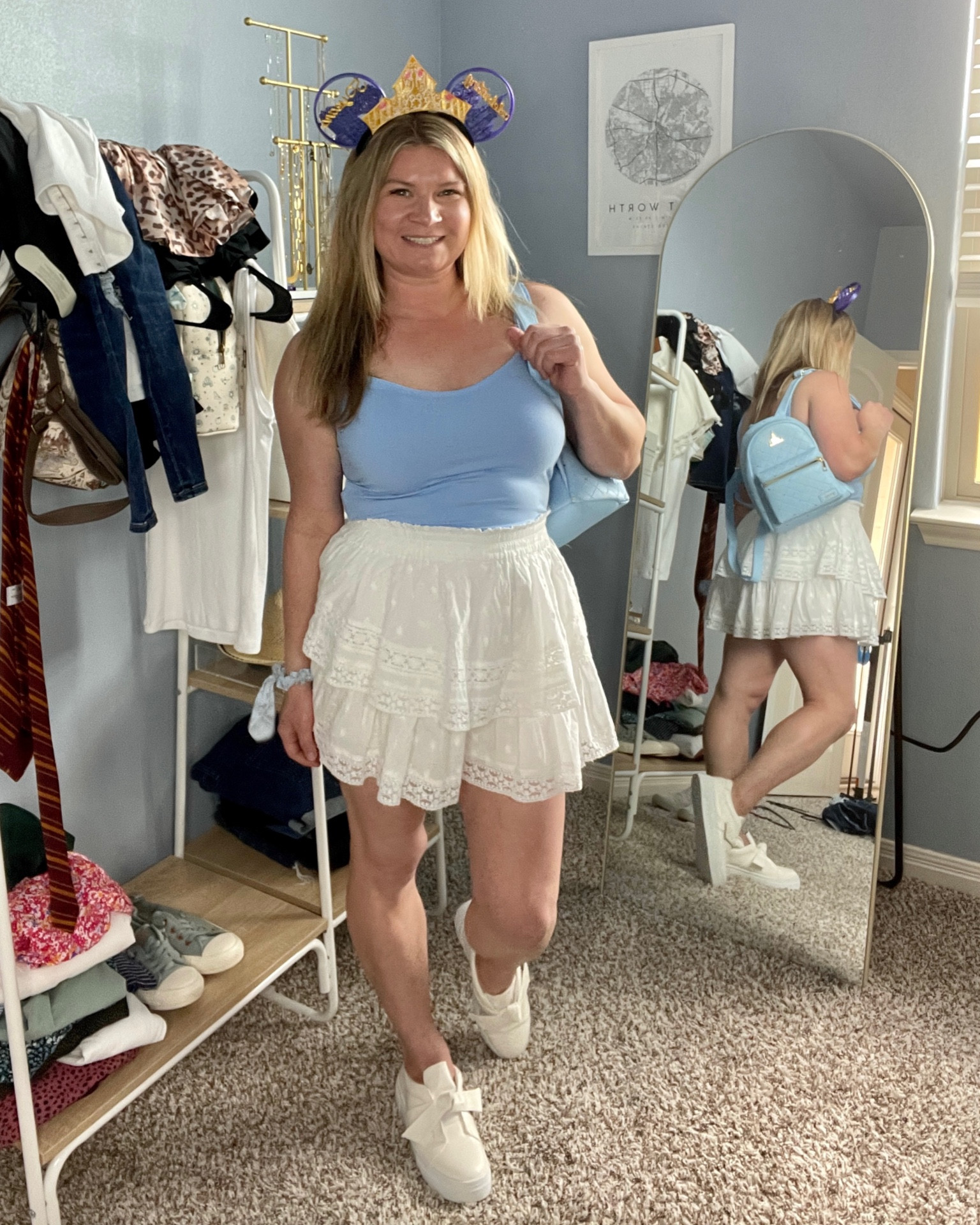 Walt Disney World Magic Kingdom outfit 

Abercrombie blue tank top and white lace skort from AE and white bow sneakers from lulus

Cinderella backpack from loungefly and ears from factory55

#LTKFind #LTKtravel #LTKstyletip