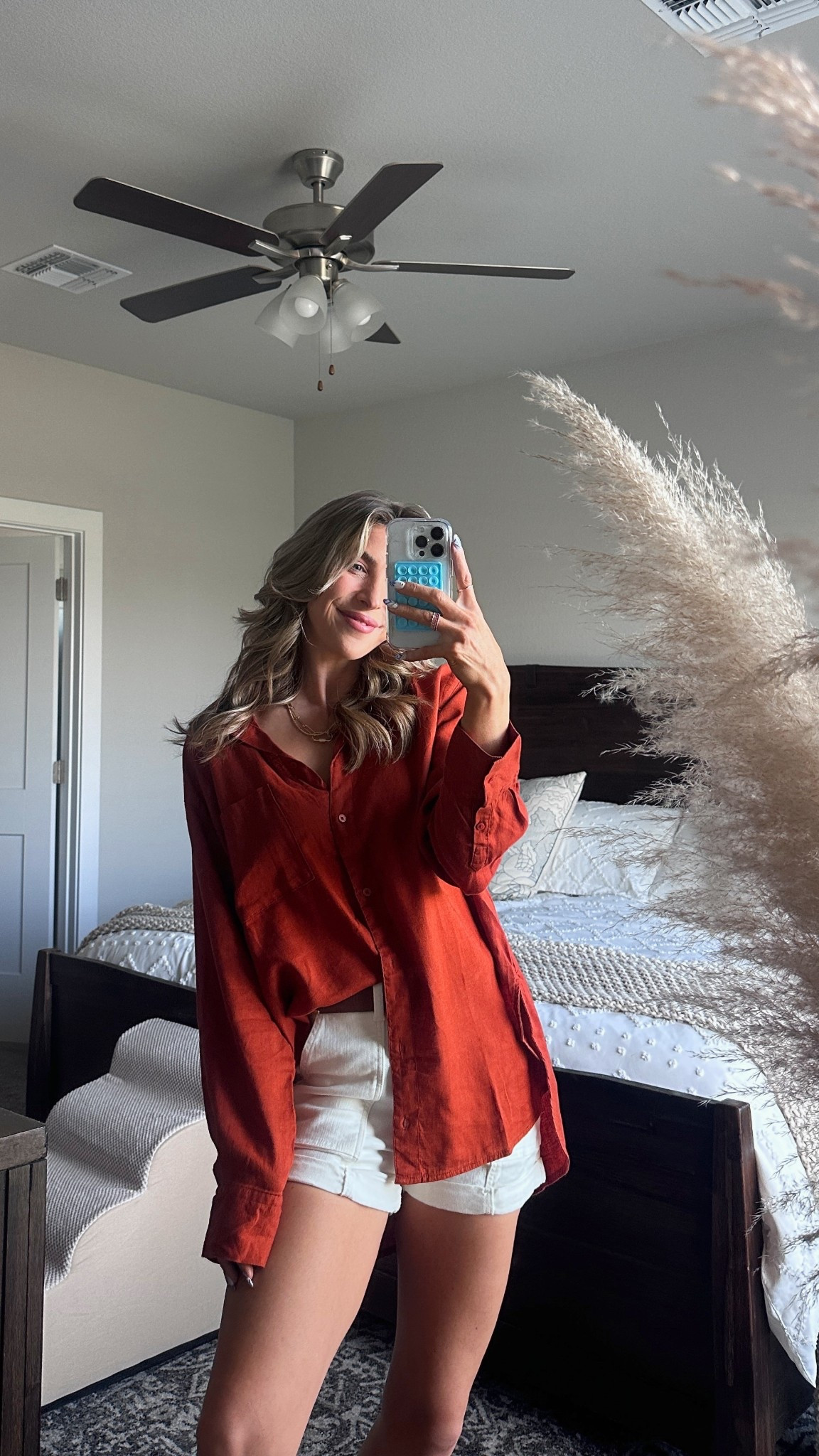 i size up to a large in my favorite boyfriend button down! i now have it in this orange, stripe, light blue, and white!

#LTKootd #LTKmomlife #LTKSaleAlert