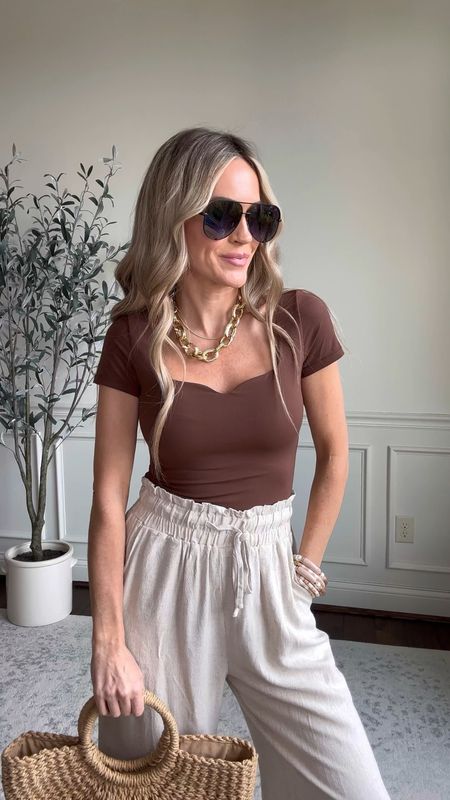 Casual spring outfit! This sweetheart neckline on the seamless short sleeve top is so cute and feminine!! Paired with linen pants (on sale today) for an elevated spring casual outfit. 

Wearing xs

Follow my shop @roseykatestyle on the @shop.LTK app to shop this post and get my exclusive app-only content!

#liketkit 
@shop.ltk
https://liketk.it/4yLyd

#LTKover40 #LTKfindsunder50 #LTKSeasonal #LTKsalealert #LTKstyletip #LTKfindsunder50