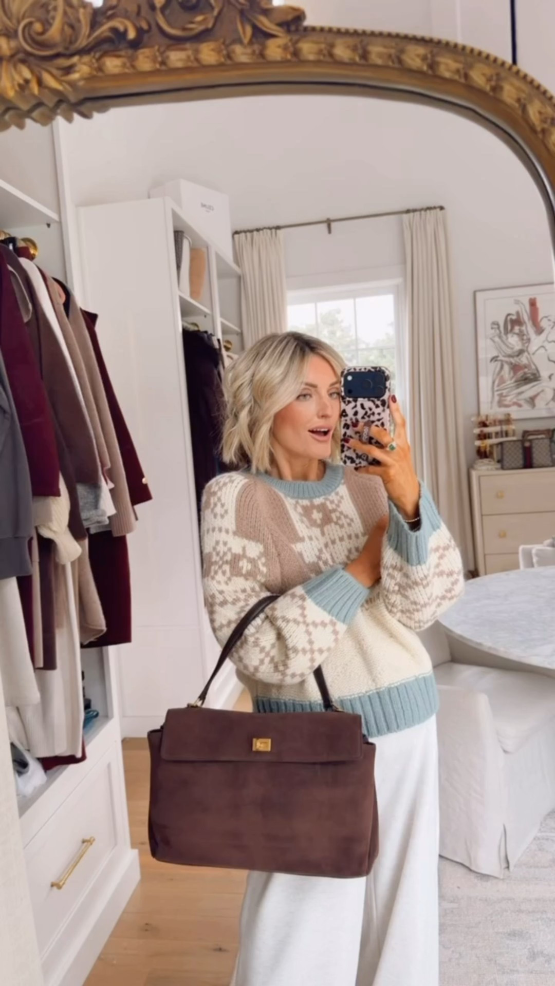 This brown faux suede and leather bag is SO good! It’s stunning in person! It looks very high end! I’ve been styling it with several outfits and even have added a scarf to it! Wearing size M in the sweater!

Loverly Grey, Amazon, brown purse, chic purse, closet staples 

#LTKSeasonal