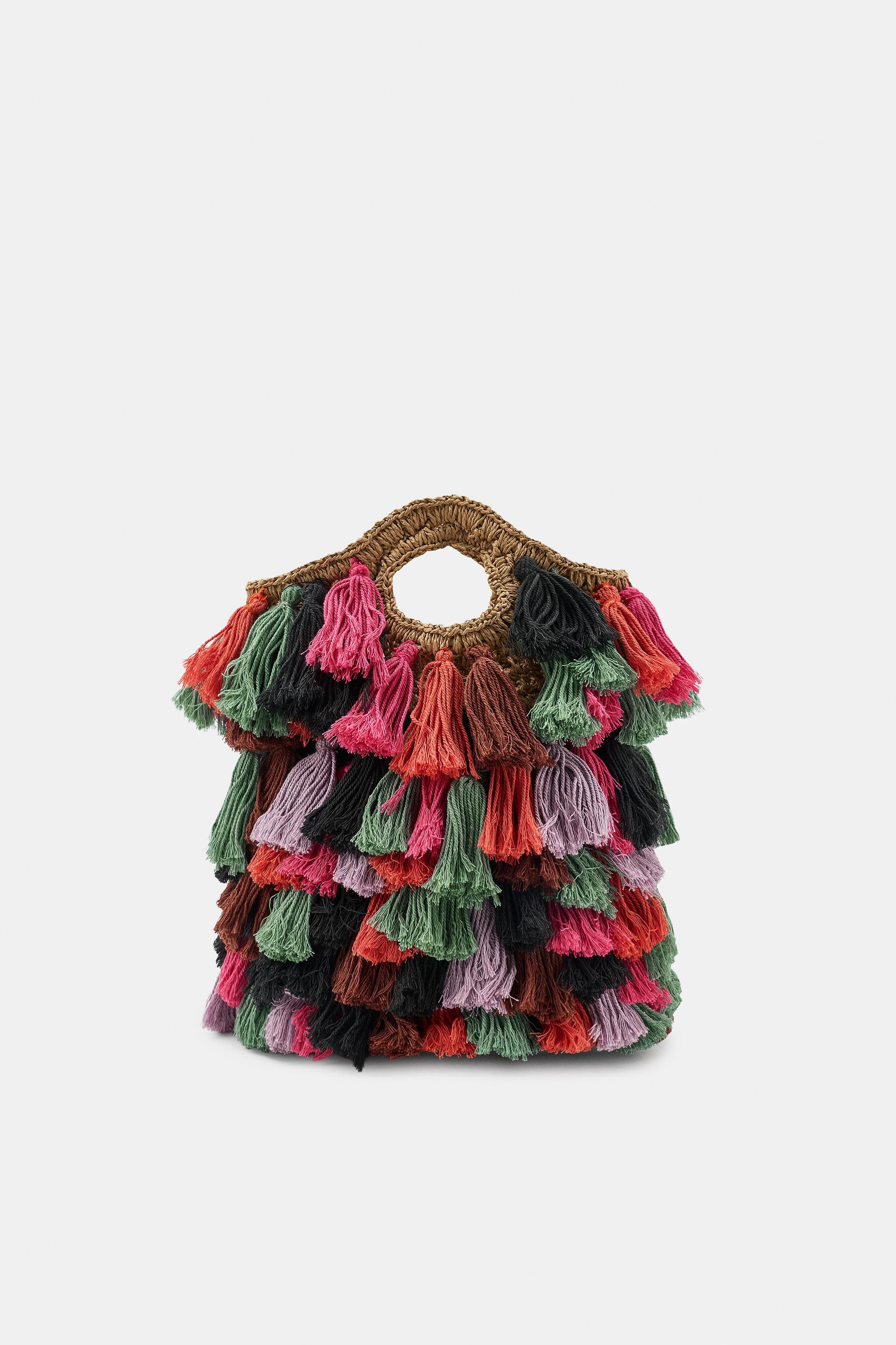 Combination bag made from a cotton blend. Contrasting raffia handles. Features a multi-colored po... | Zara US