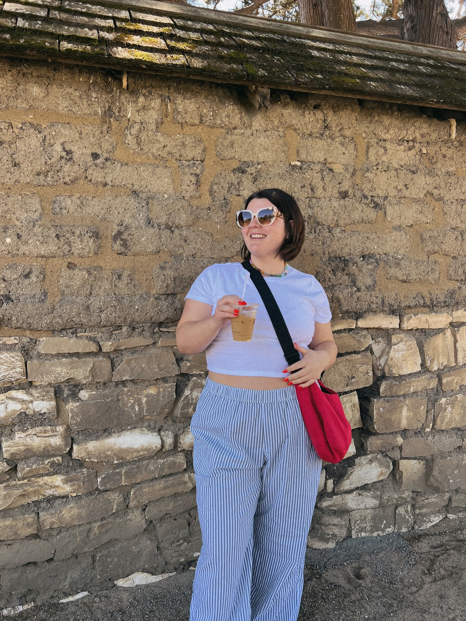Casual comfy cute midsize and postpartum friendly outfit of the day. The pajama pant trend is perfection fright now. Size XXL short (they were a bit too big but shrunk in the wash luckily), size XL top (comes in a few colors!), my candy apple medium baggu! Anthropologie sunglasses and amazon necklace  

#LTKfindsunder50 #LTKmidsize #LTKSeasonal