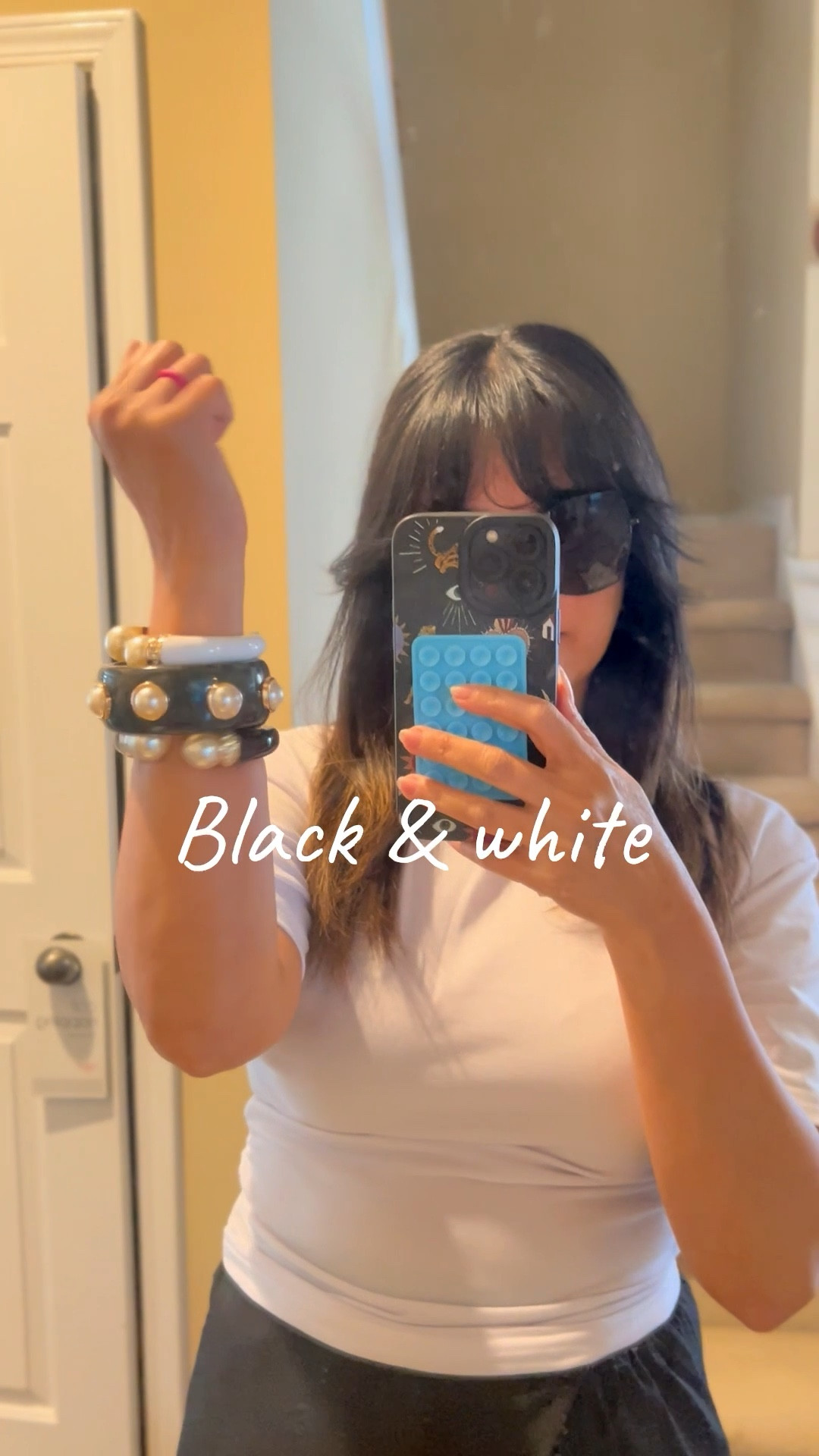 My Sunday uniform: simple… but make it grand ✨
A basic white tee that cinches the waist (but keeps the sleeves comfy) + statement accessories to elevate the whole look.

These bangles are my current obsession—I loved the black one so much, I had to grab the white too. The quality and look are just that good.

Effortless, elevated, and perfect for everyday chic 🤍