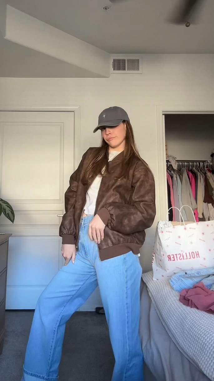 jeans are a size 25, pink sweatshirt is a size S, pink shorts are a size S, white skirt is a size S, brown jacket is a size M, and slippers are a size M. the hat is sold out right now💔