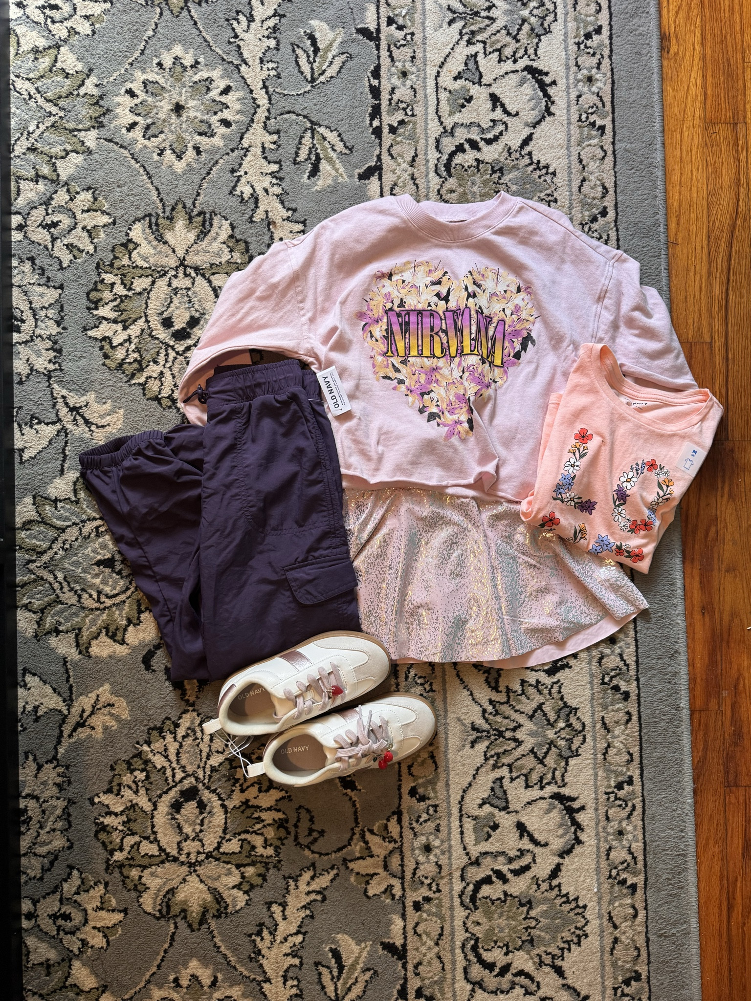 My daughter picked out some cuteeee pants!! I love the joggers and the long sleeve graphic tee. I got her a six 10/12 in the shirt so it’s longer and can fit her longer. Her pants are size 8 (she’s 7 btw) and her shoes are size 2

#LTKFamily #LTKSaleAlert #LTKKids