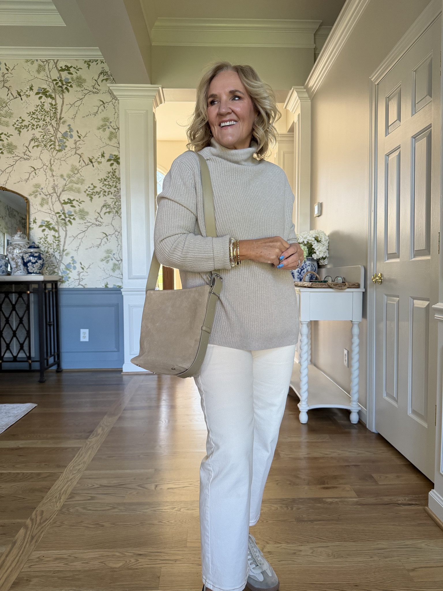 Cold spring! This cashmere is back in stock. Wearing a medium 
Jeans size 28 petite 
Suede purse is a beautiful neutral 
20% off my bracelets code NANETTE20

#LTKPetite #LTKSeasonal #LTKOver40