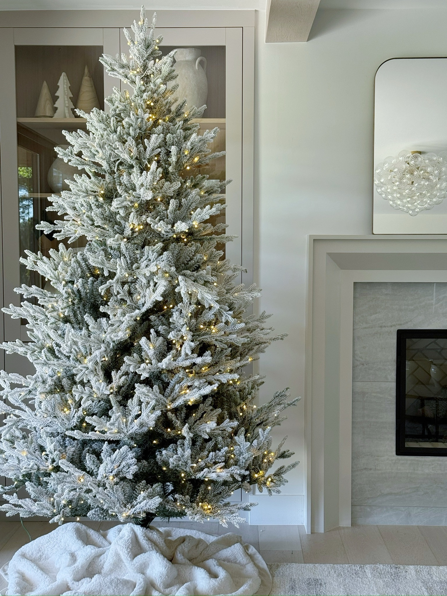 This flocked tree is perfection! I plan on making this whole room a flocked wonderland and cannot wait to show it to you! Stay tuned! 

Neutral home/organic decor/styling/home essentials/bedroom decor/living room decor/wayfair/favorite finds/home decor/Christmas decor/Holiday decor/mantel/garland/stockings/flocked tree/styled shelves 

#LTKHoliday #LTKStyleTip #LTKHome