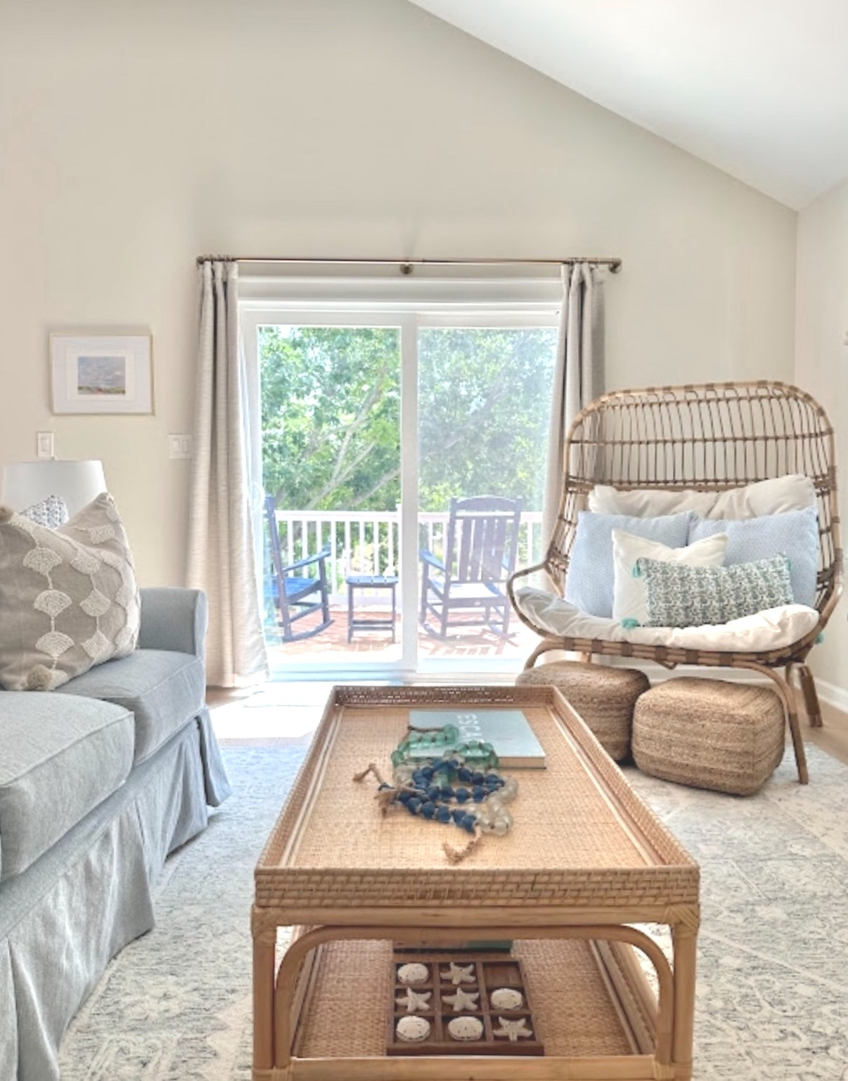 This rattan coffee table has held up beautifully—a great S&L look for less! 

And these poufs are perfect to move around and use as needed—they make great foot rests! 

#LTKHome