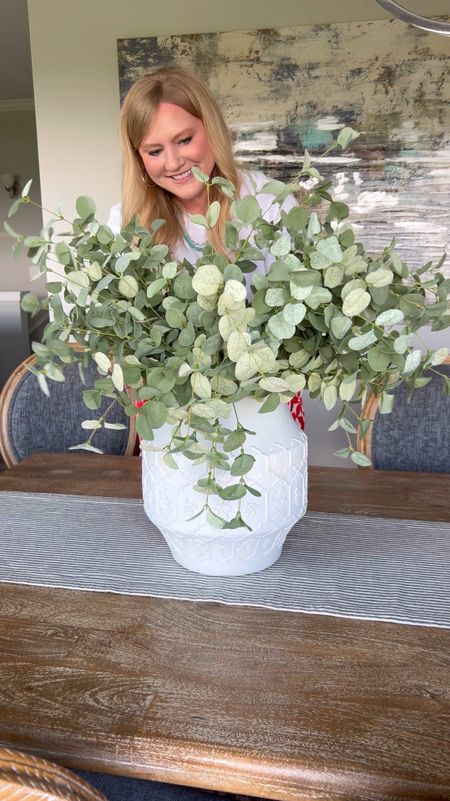 This neutral vase and eucalyptus combo could be used as a table centerpiece or as an accent to an entryway or console table.

#LTKSeasonal #LTKFindsUnder100 #LTKHome