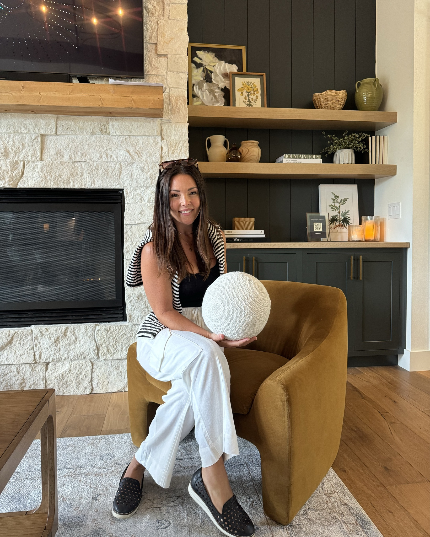 Visiting @walmart headquarters was so fun. We visited a stunning home theater was entirely furnished and decorated with all Walmart! Here are some of my favorite pieces correctly in stock! 
Velvety cognac arm chair 
Brass floor lamp
Ball pillow 
Decorative vases wood and ceramic 
Wooden fruit bowl
Fluted table lamp 
My  black and white sweater cardigan with linen cargo pants. 
Velvet green dining chairs 

#walmartpartner #walmarthome #walmartfashion

#LTKHome