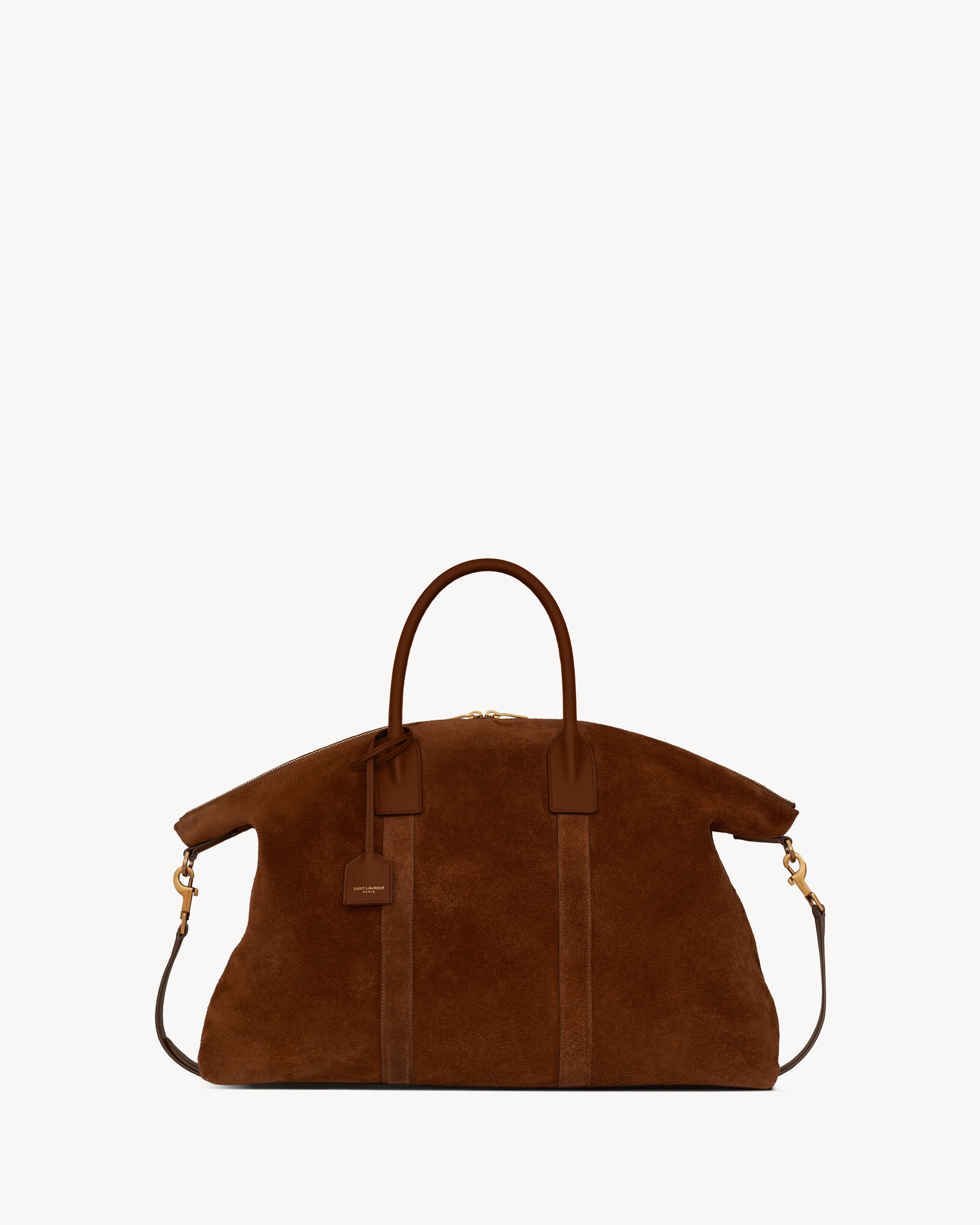 oversized Saint Laurent Paris embossed zip bowling bag with tubular leather top handles and an ad... | Saint Laurent Inc. (Global)