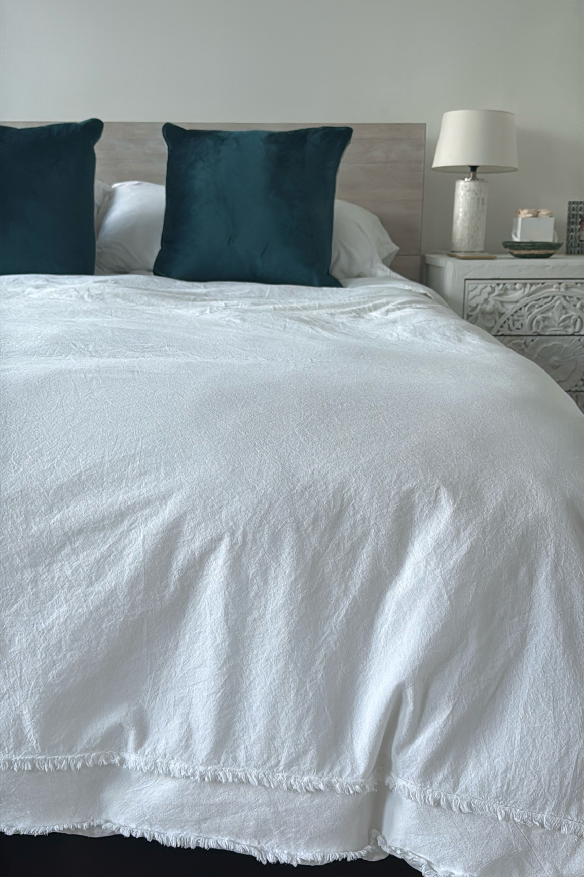 Bedding Sale | My white duvet, shams and throw pillows are currently on sale! I love the fringe detail and the duvet has gotten even better with each wash. The bedding items are available individually or as a set! 

White bedding, fringe bedding, Duvet cover, duvet insert, shams, bedding, pillows, bed linens, linen duvet, throw pillows

#LTKFindsUnder100 #LTKHome #LTKSaleAlert