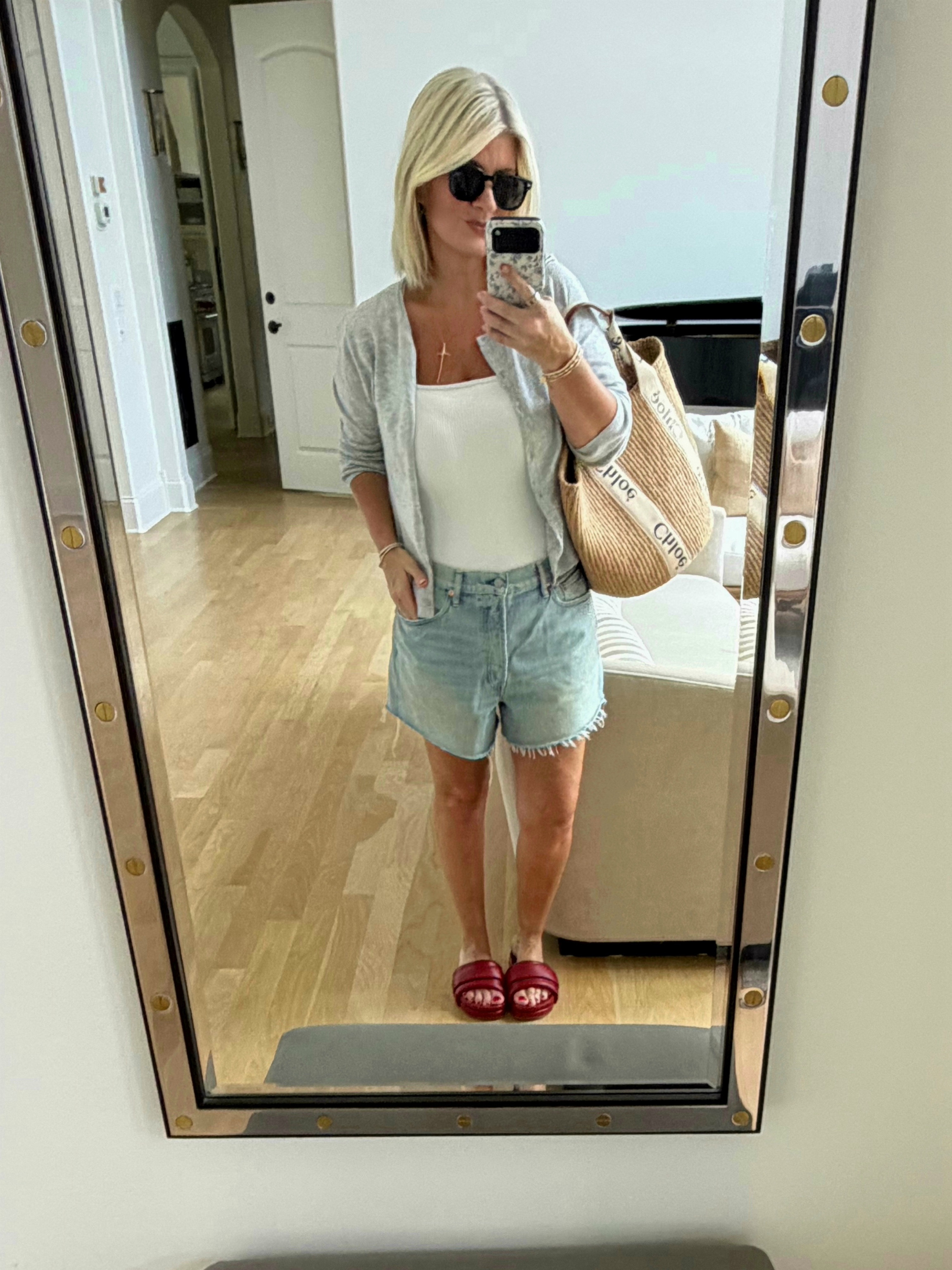 I love an effortless summer look!  But i’ve always gotta have a light sweater because it’s hot outside, but cold inside. This little cardigan is literally PERFECT. Hurry it’s on the Nordstrom sale and SUPER affordable. 

The sunnies are cheapies at Amazon and 🤌🏼

My shorts are from Buck Mason and unfortunately sold out - but I found some similar ones at Madewell and they're on sale. 💃 

I have multiple of these bodysuits. They’re my go-to.

My shoes are from Commbi but they don't link ... however, any great slide will work!

#LTKdayinmylife #LTKootd #LTKSaleAlert