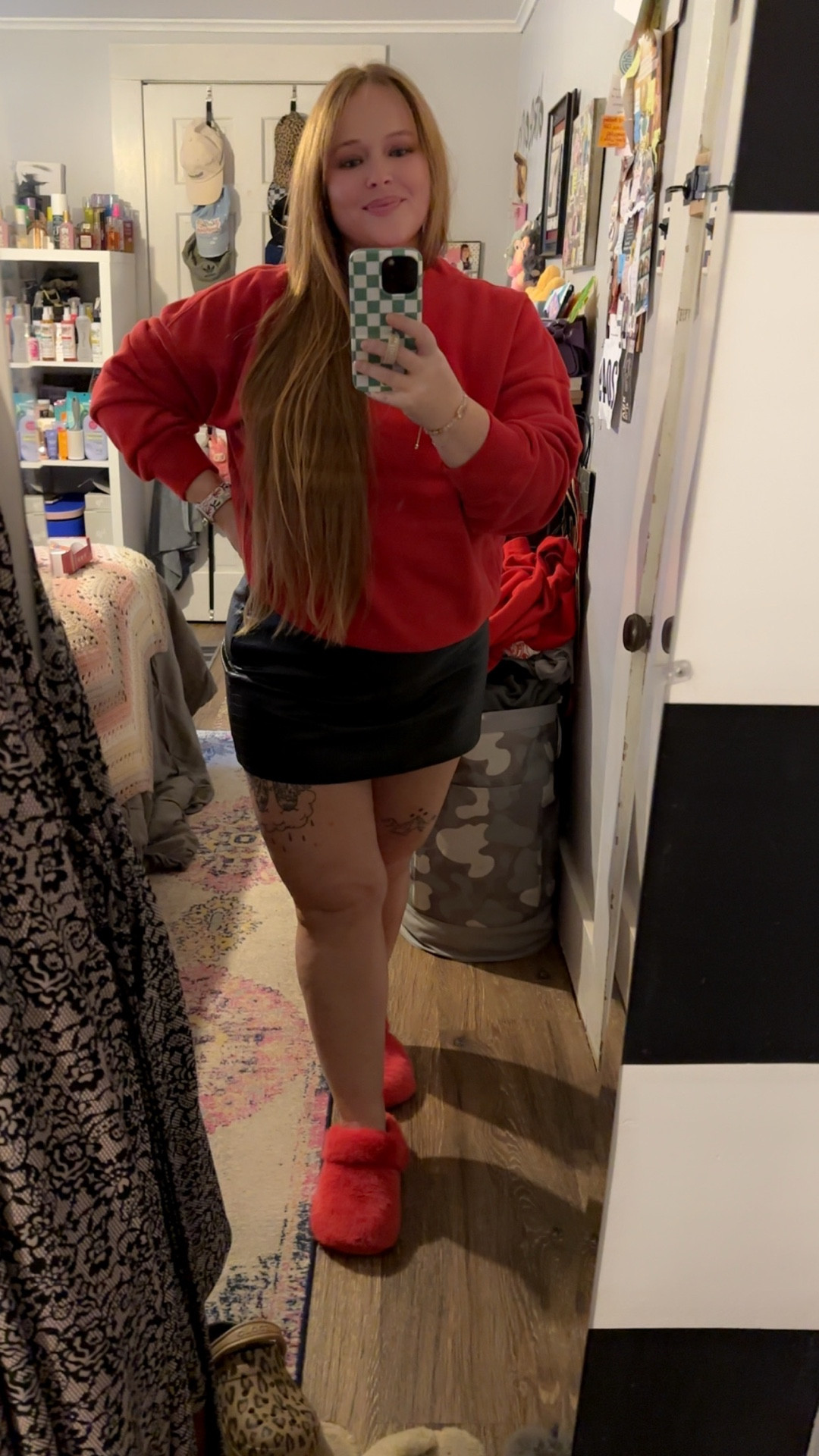 Merry Christmas!!! 🎄 

Today’s OOTD is from Abercrombie. The red faux turtle neck is THE softest and coziest sweater! The skirt is a leather alligator pattern skirt really with the built in shorts. 

We are hosting dinner so I’m just wearing my slippers, the fuzzy Crocs. For accessories I went with a necklace my friend gifted me, my festive watch band and some new Coach earrings. 

Hope you have all had a lovely Christmas! 

#LTKootd #LTKHoliday #LTKMidsize