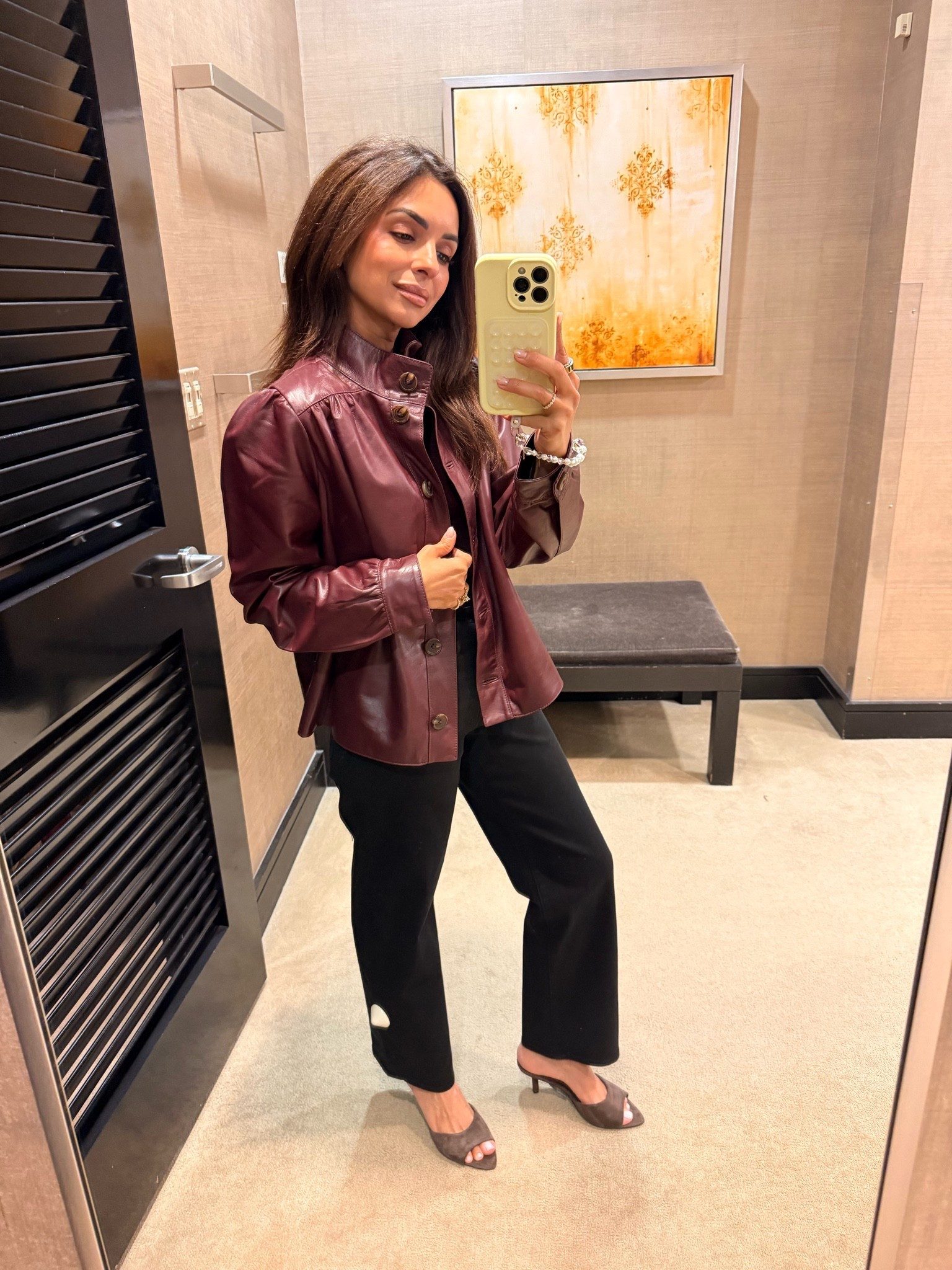 The color of this burgundy leather jacket is stunning in person! I’m wearing an XS in the jacket (it runs a little bit), an XS in the sweater top and a 24 in the jeans.