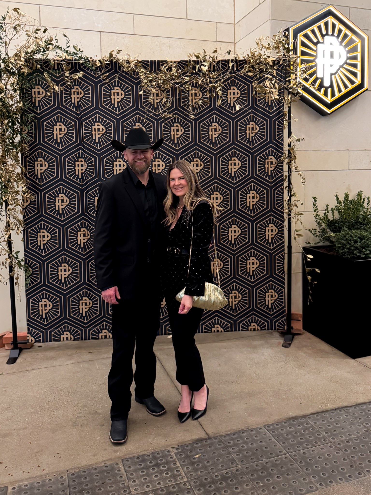 What we wore to a new restaurant opening in Nashville last week. It was an all black formal cocktail theme so my husband basically needed a whole new outfit. @kohls to the rescue last minute for the coat, black jeans and black shirt. Ariat boots from Academy and had the Stetson. I’ll link my blazer from @VICI 

#LTKMens #LTKootd #LTKdayinmylife