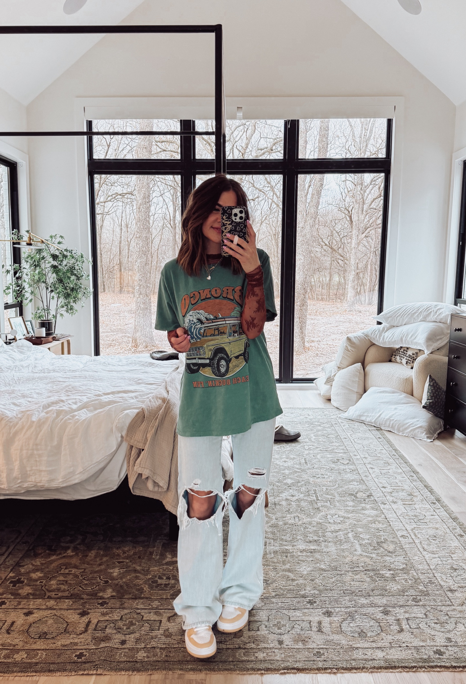 layered my graphic tee (size large) with a mesh long sleeve top (size small). denim is one of my favs (wearing size 5/26, and could size down to a 3/25). sneakers are tts

#LTKfamily #LTKMostLoved #LTKstyletip