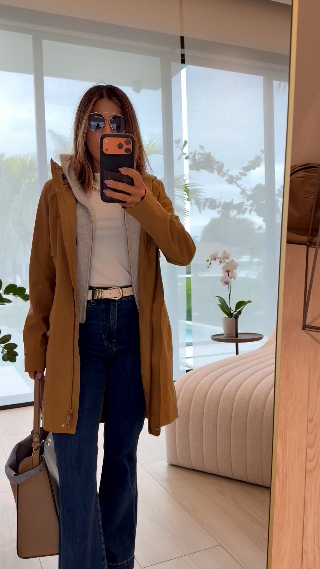 Full Outfit, jeans and baby Tee + the most amazing waterproof trench (yes not water repellent, you literally can stand in the shower for 30 minutes) and my new Fendy Way Bag 

#LTKOver40 #LTKmomlife #LTKPetite