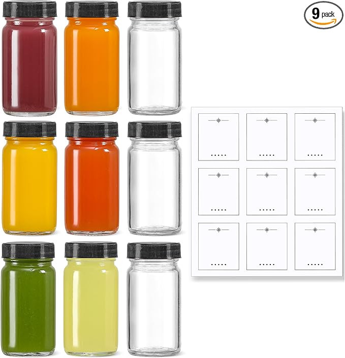9 Pack, 2 oz Glass Shot Bottles w/ Black Lids & 9 Labels - Small Clear Jar for Ginger, Wellness S... | Amazon (US)