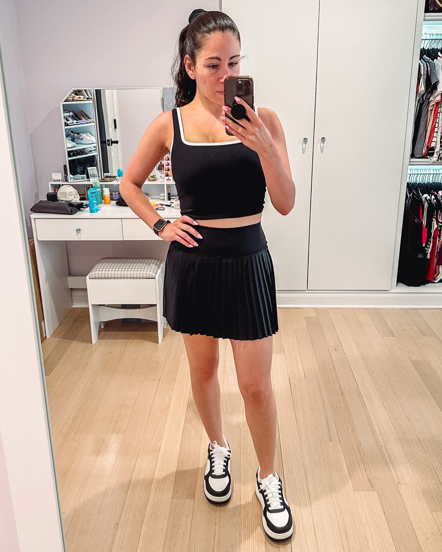 Another cute active set with a pleated skirt and black and white tank. Comes with a matching scrunchie. Paired with alo yoga recovery sneakers. 

#LTKSummerSales #LTKFitness #LTKShoeCrush