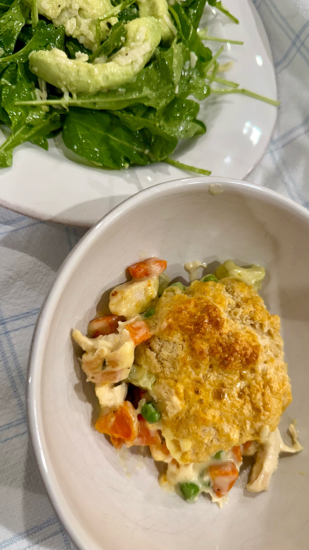 I’ve been in a comfort mood the past few days and craved chicken pot pie. I usually buy them but decided to make a healthy-ish version of this classic at home and the results were better than I could have imagined. This portion is for 4 people and Bryce and I ate the entire thing!

Chicken pot pie Ingredients-
* 1 tablespoon extra-virgin olive oil
* 1 cup diced carrots about 3 medium
* ½ cup diced celery about 1 large stalk
* 1 ½ teaspoons garlic powder
* ½ teaspoon kosher salt
* ¼ teaspoon ground black pepper
* ¼ cup all-purpose flour
* 2 cups unsweetened almond milk (I used regular milk)
* 2 cups cooked and shredded boneless, skinless chicken breasts* about 8 ounces or 2 small breasts
* ½ cup frozen peas
* ½ cup frozen pearl onions (I skipped the onions)
* 1 tablespoon chopped fresh thyme

Biscuit ingredients-
* 2 cups all-purpose flour
* 1 tablespoon baking powder
* 1 teaspoon salt
* 1/2 cup unsalted butter, cold and diced
* 3/4 cup buttermilk
* 1 egg, beaten (for egg wash)

Biscuit Instructions- 
1. Mix flour, baking powder and salt. 
2. Add butter and work into mixture
3. Lightly mix in milk, but don’t over mix.

Pot pie Instructions-
1. Sauté the carrots, celery, and spices in olive oil. 
2. Scatter flour over the vegetables, and let cook for a few minutes. Add the milk little by little, stirring to incorporate. Boil the mixture until thickened, then add the chicken, peas, onions, and thyme. Transfer the mixture to a pie dish. 
3. Place the biscuits on top of the dish. Brush them with the egg wash
4. Bake the chicken pot pie at 425 degrees F for 25 minutes, until golden. Let the pot pie sit for a few minutes, then enjoy!



#LTKfoodie #LTKHoliday